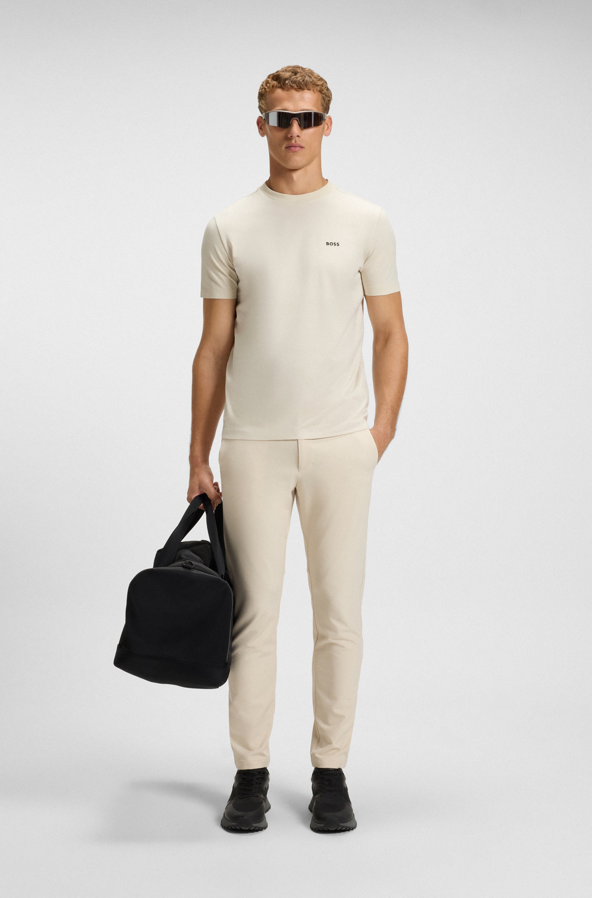 Slim-fit trousers in water-repellent stretch fabric