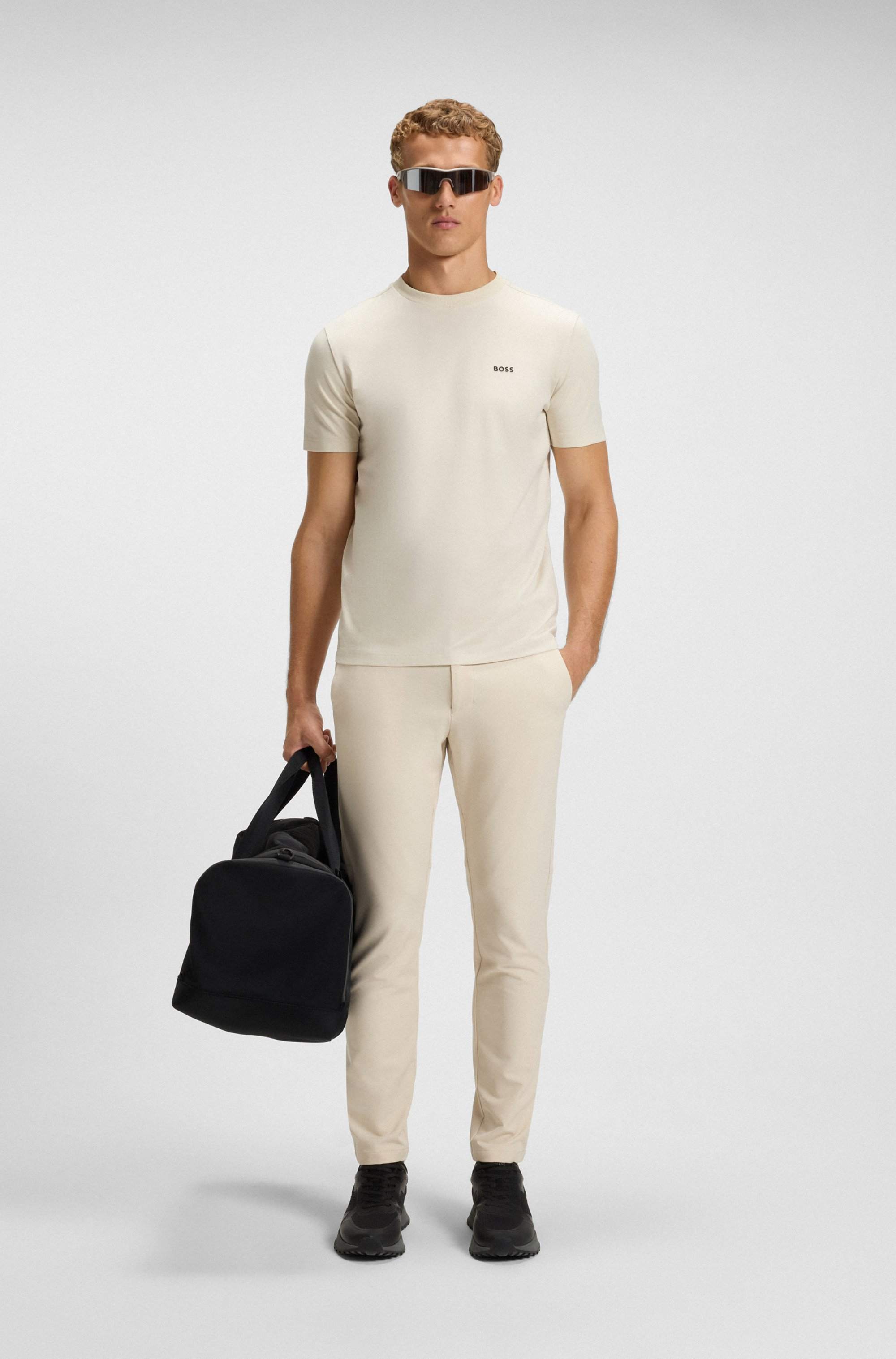 Slim-fit trousers in water-repellent stretch fabric