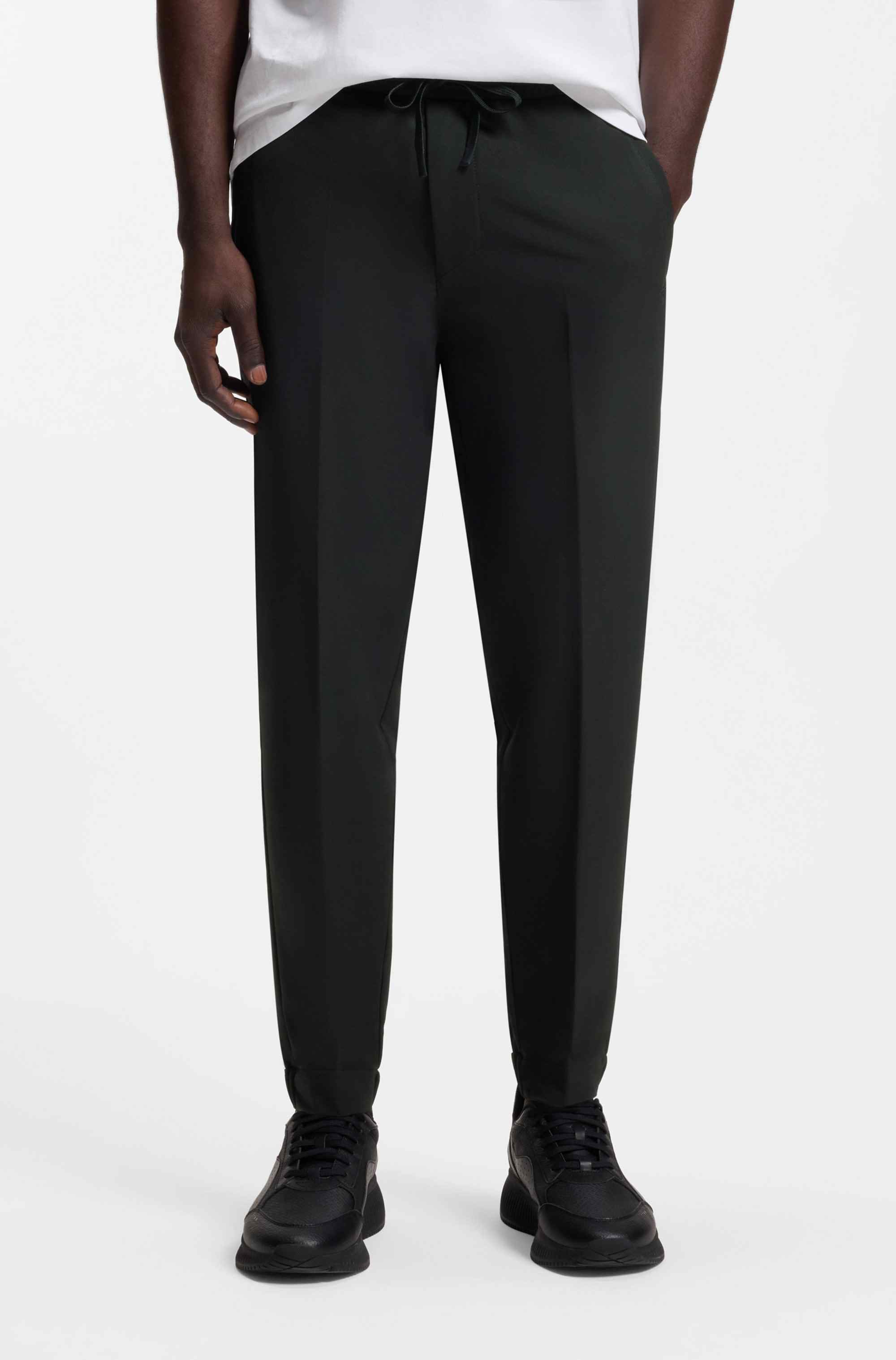 Tapered-fit trousers in water-repellent stretch fabric