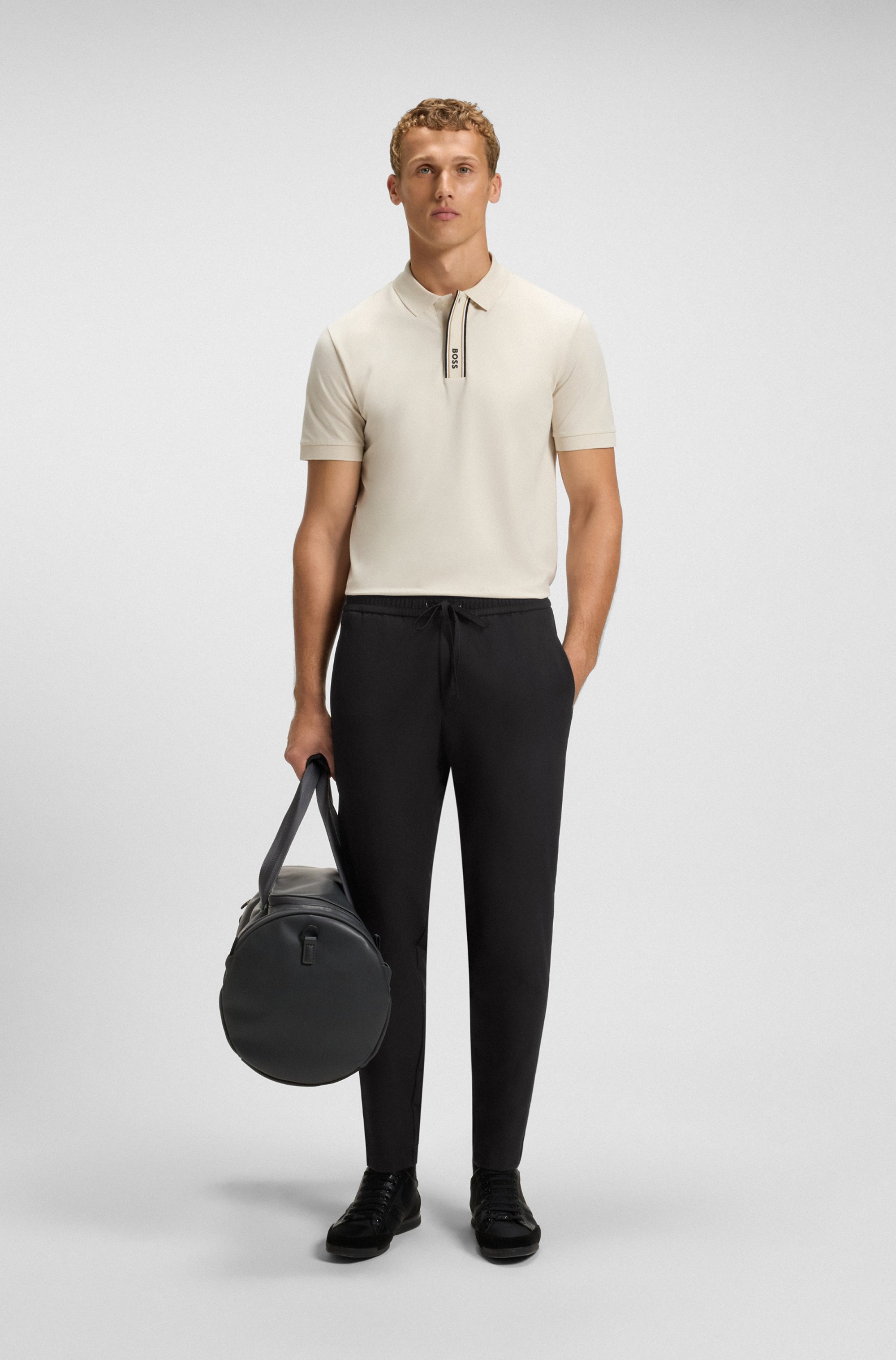 Tapered-fit trousers in water-repellent stretch fabric