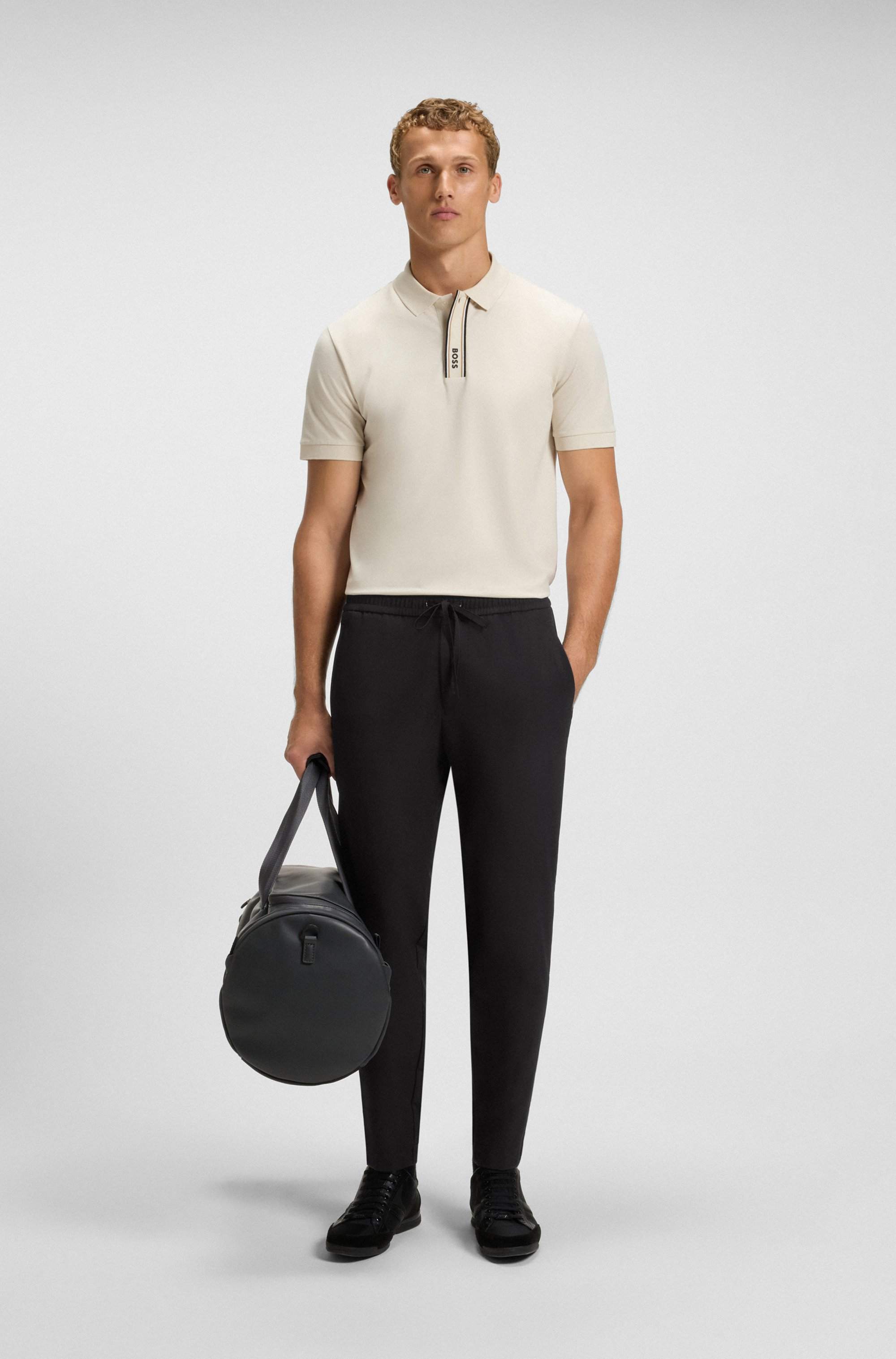 Tapered-fit trousers in water-repellent stretch fabric