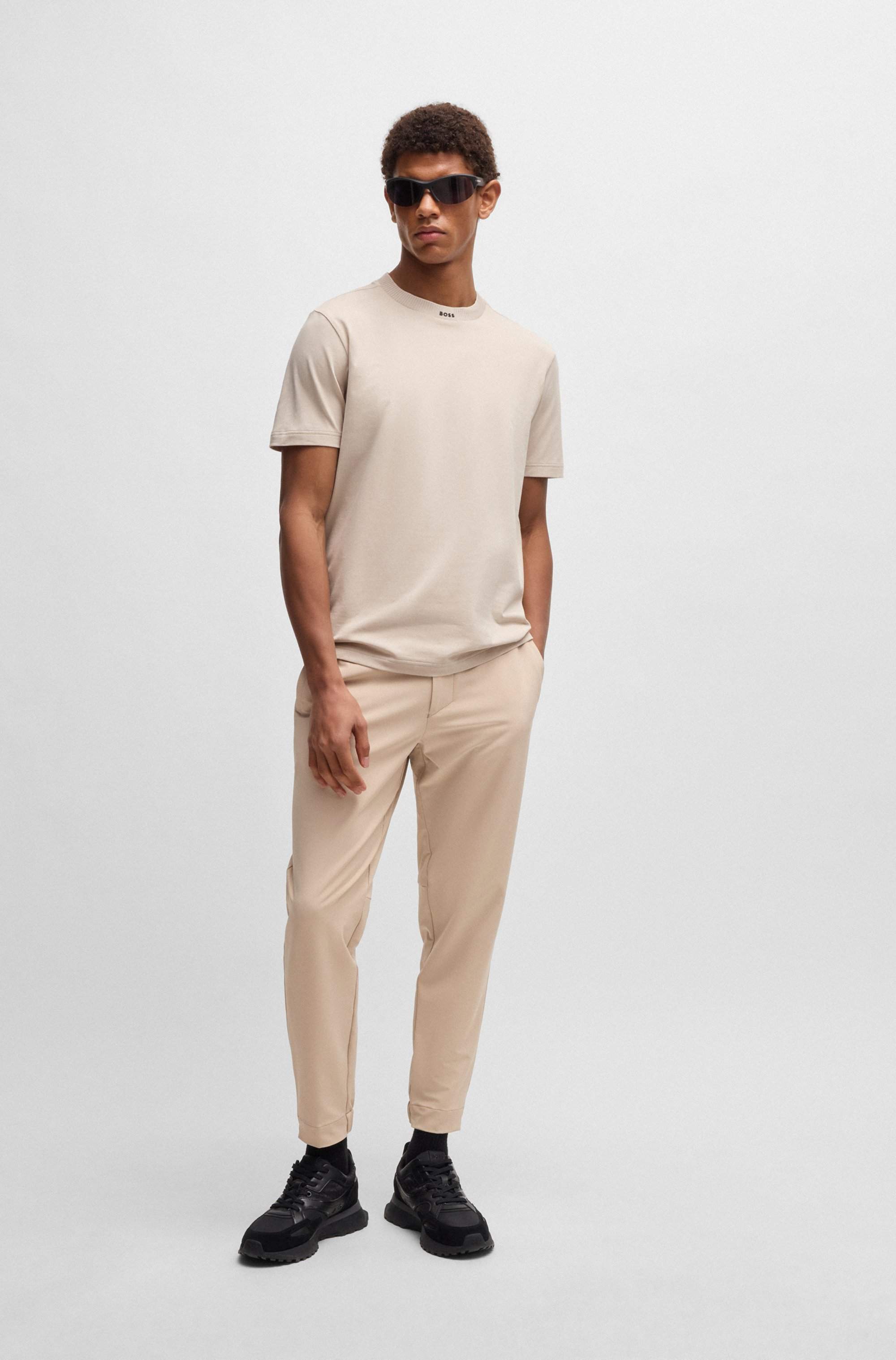 Tapered-fit trousers in water-repellent stretch fabric
