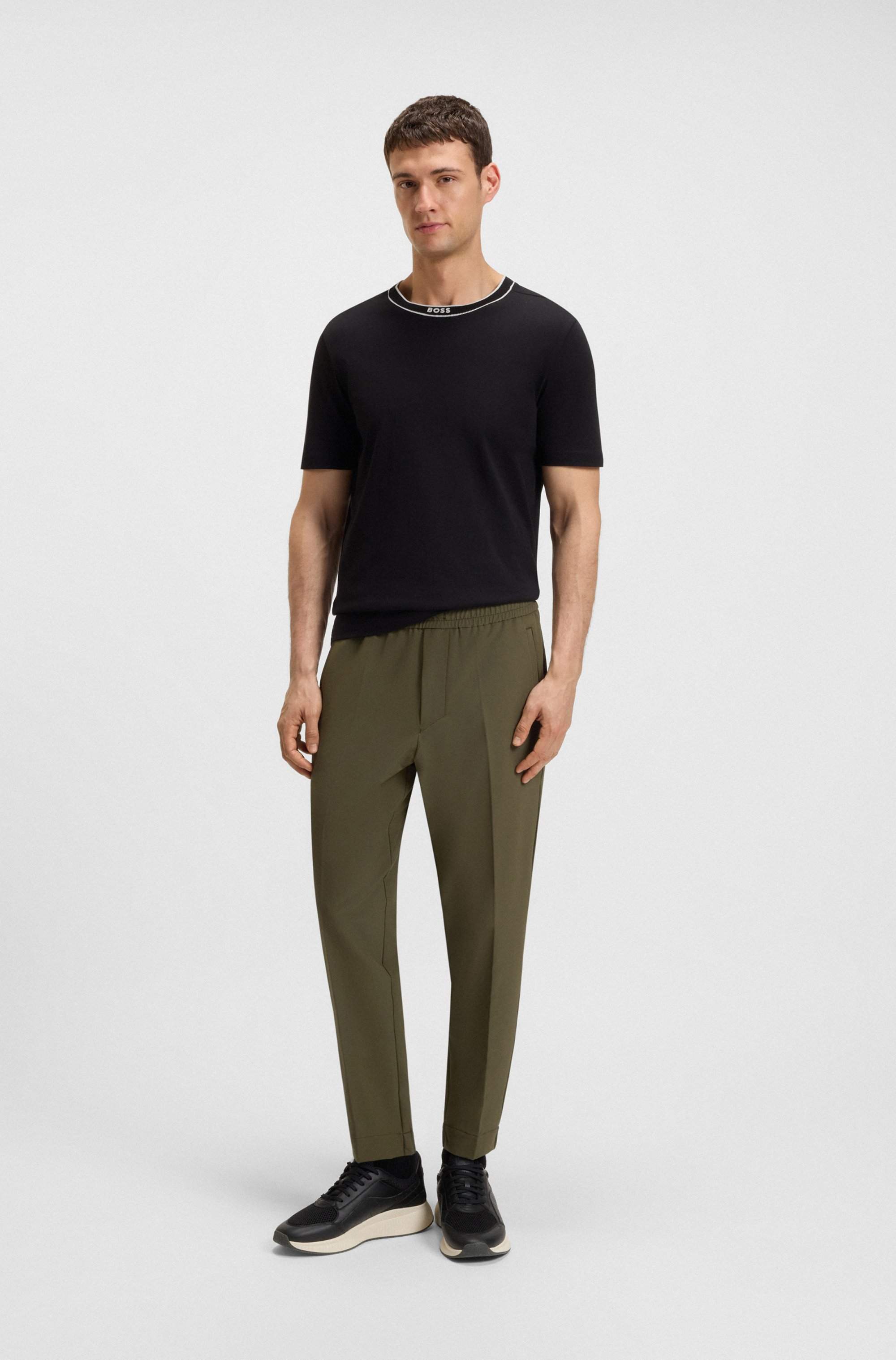 Tapered-fit trousers in water-repellent stretch fabric