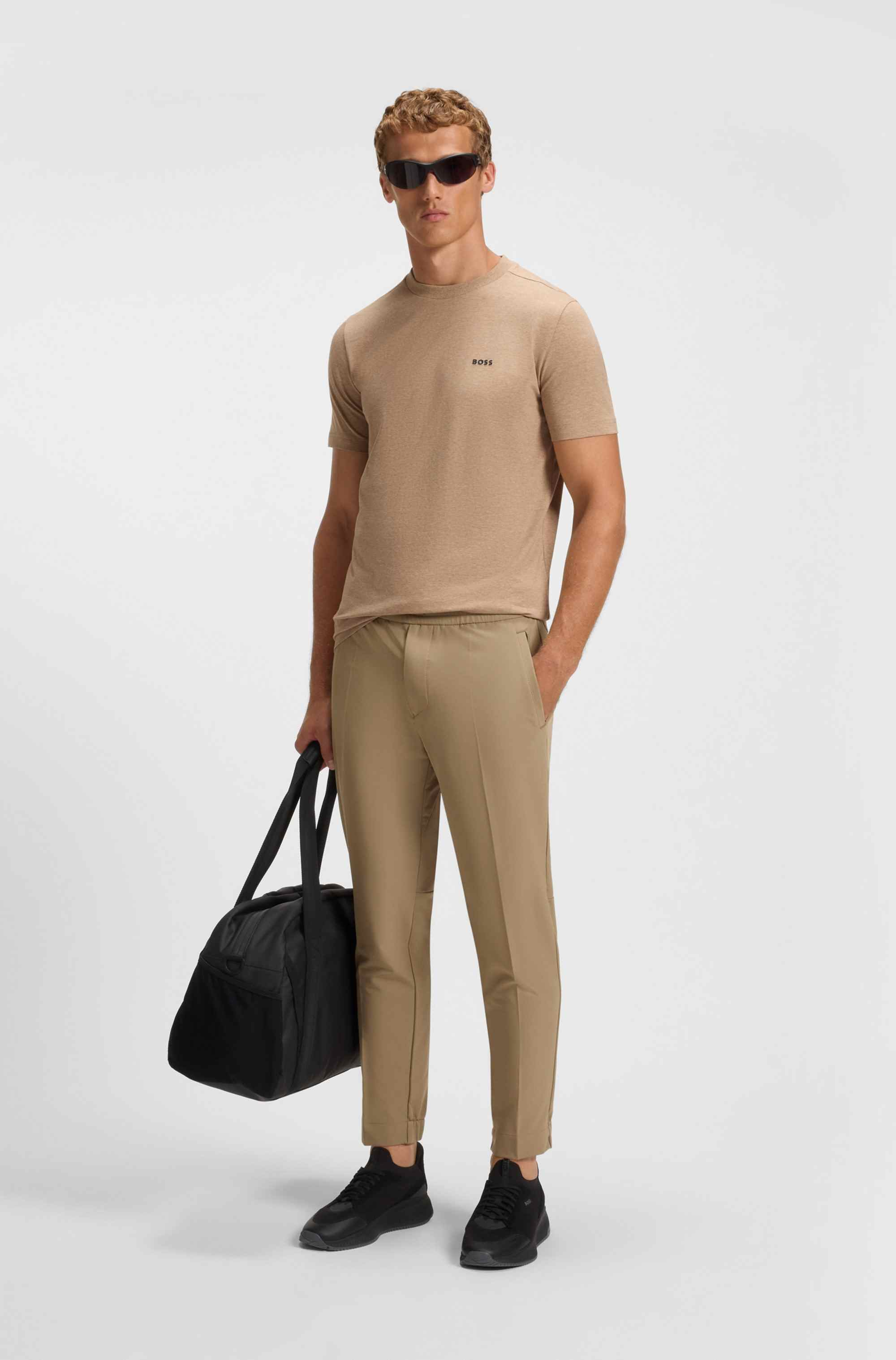 Tapered-fit trousers in water-repellent stretch fabric
