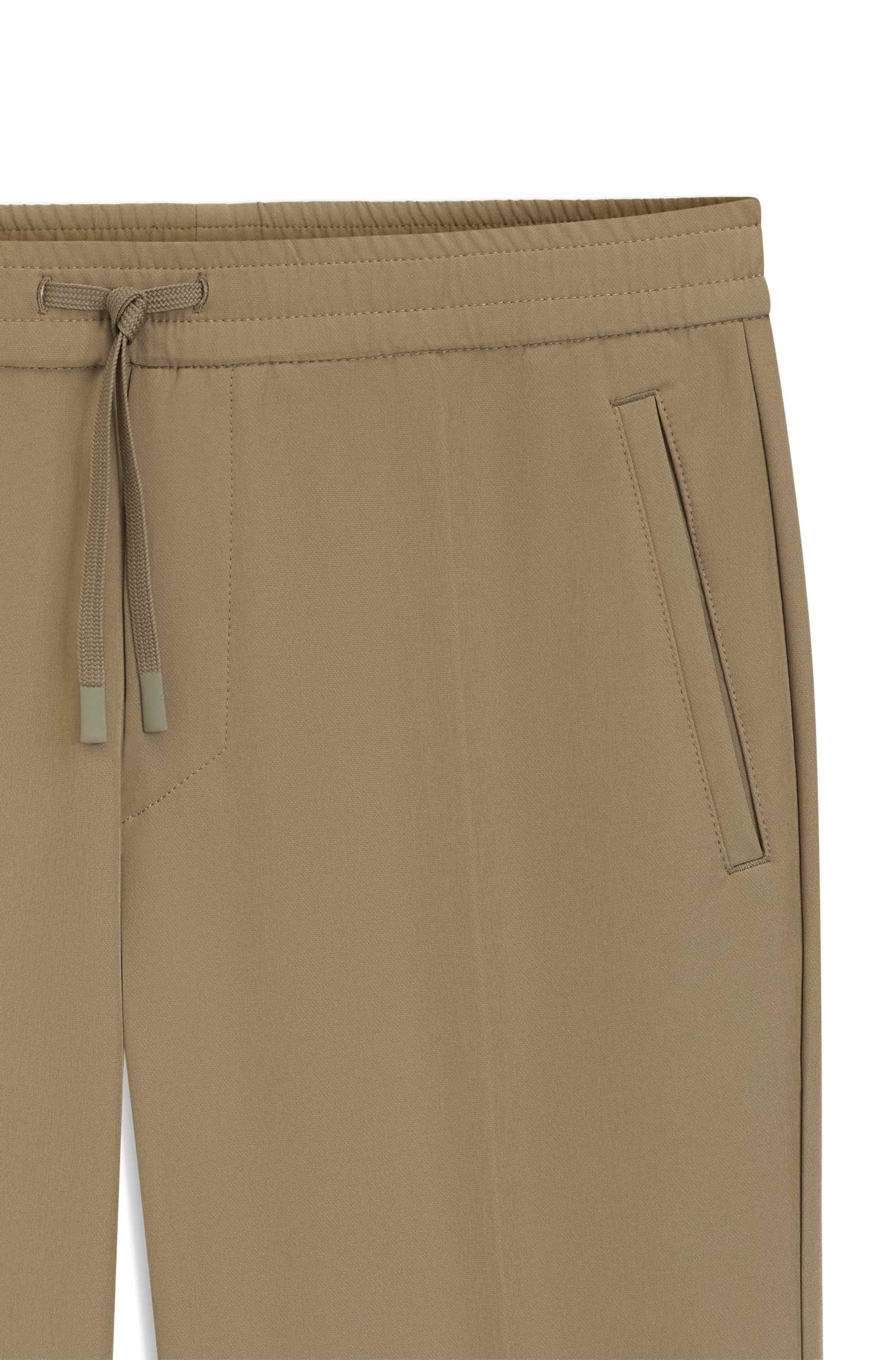 Tapered-fit trousers in water-repellent stretch fabric