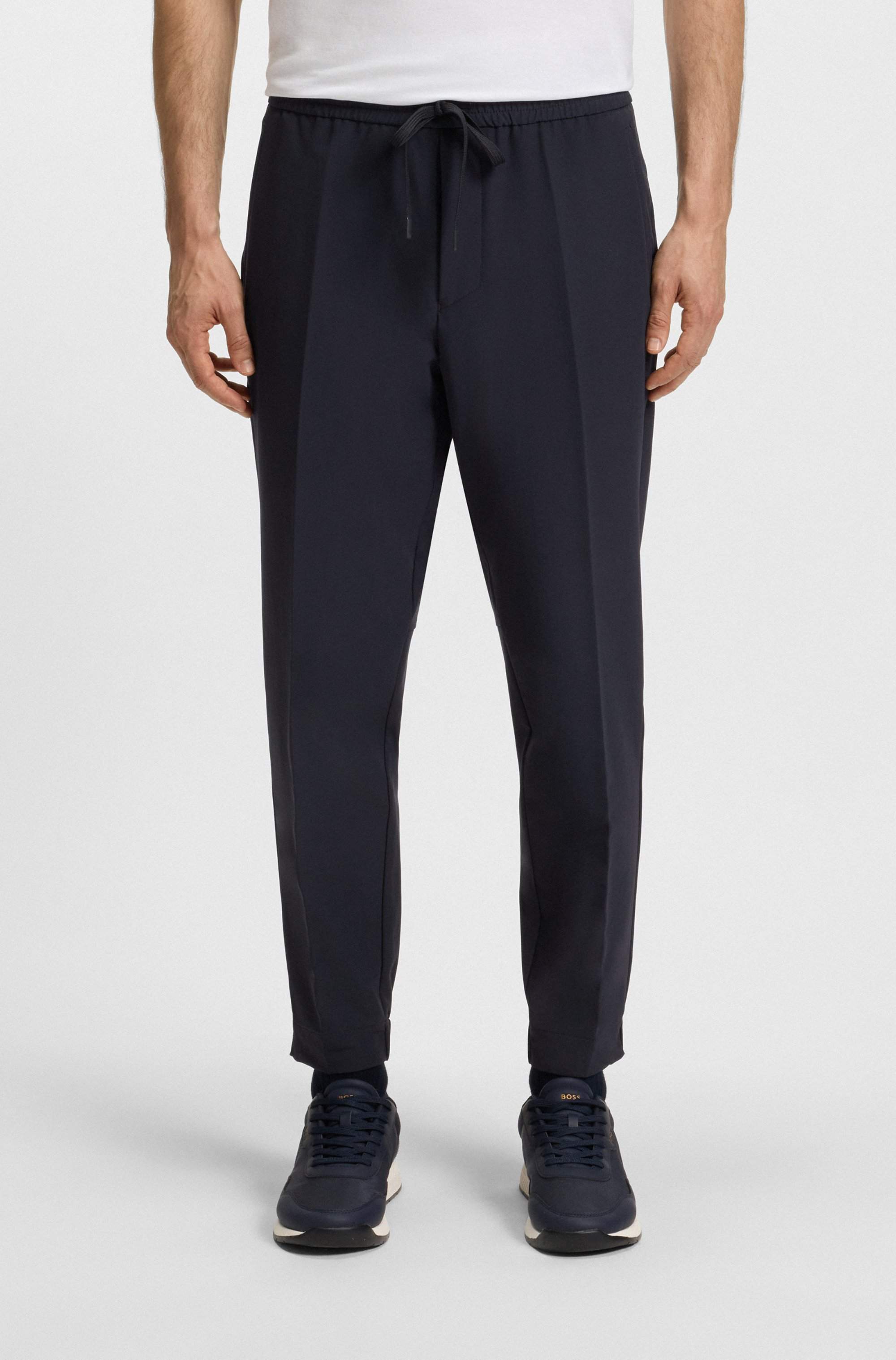 Tapered-fit trousers in water-repellent stretch fabric