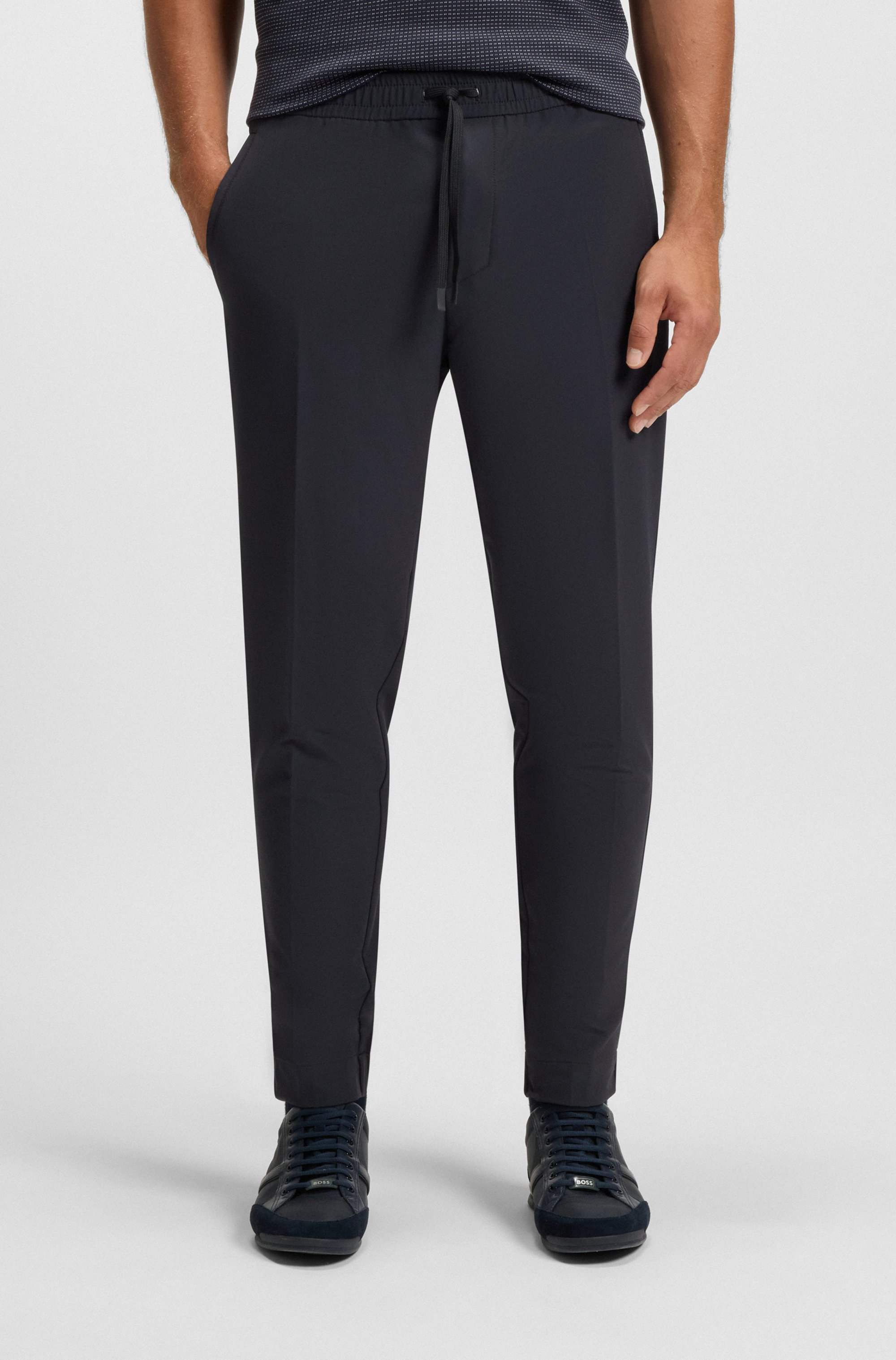 Tapered-fit trousers in water-repellent stretch fabric