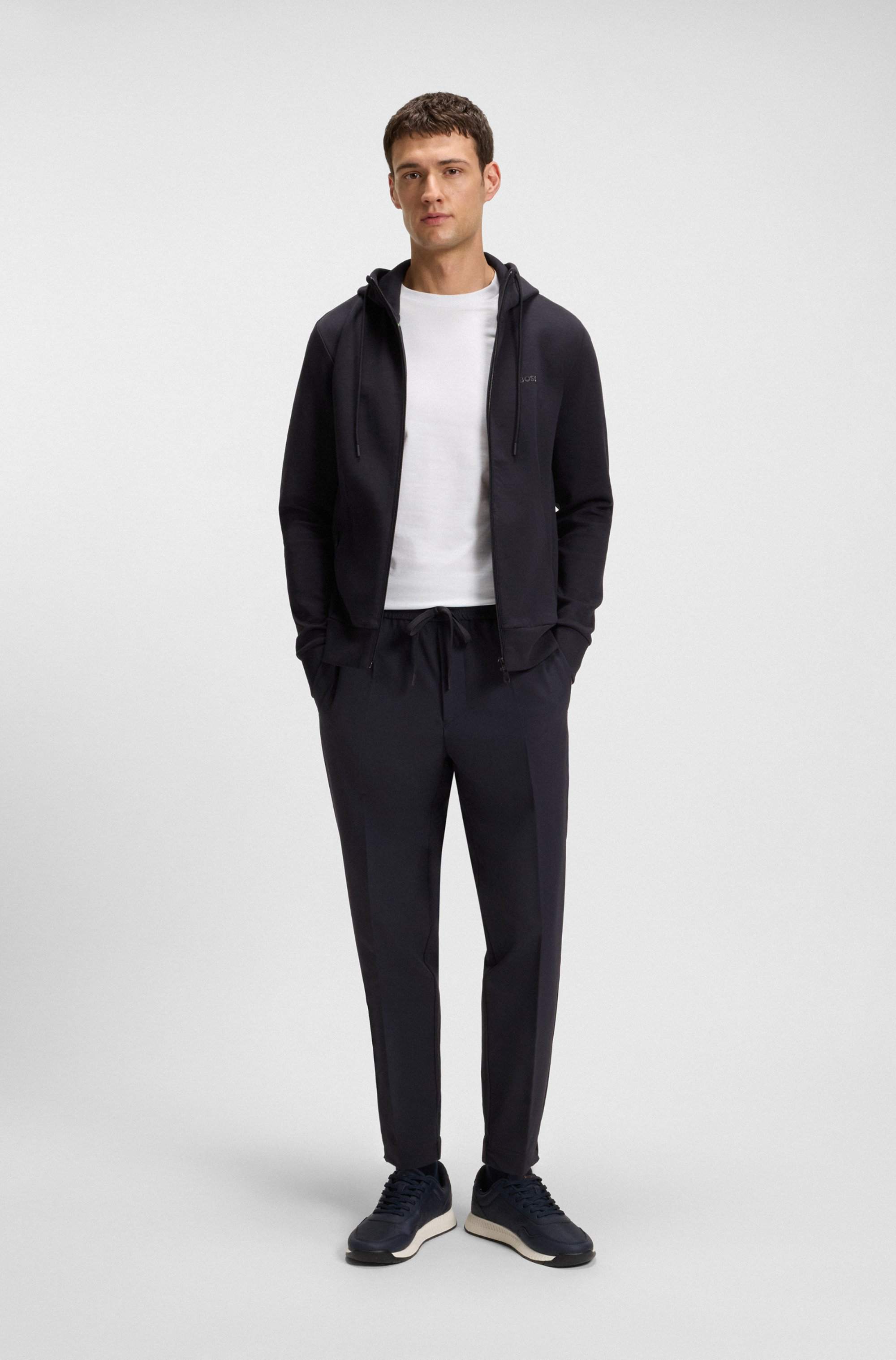 Tapered-fit trousers in water-repellent stretch fabric
