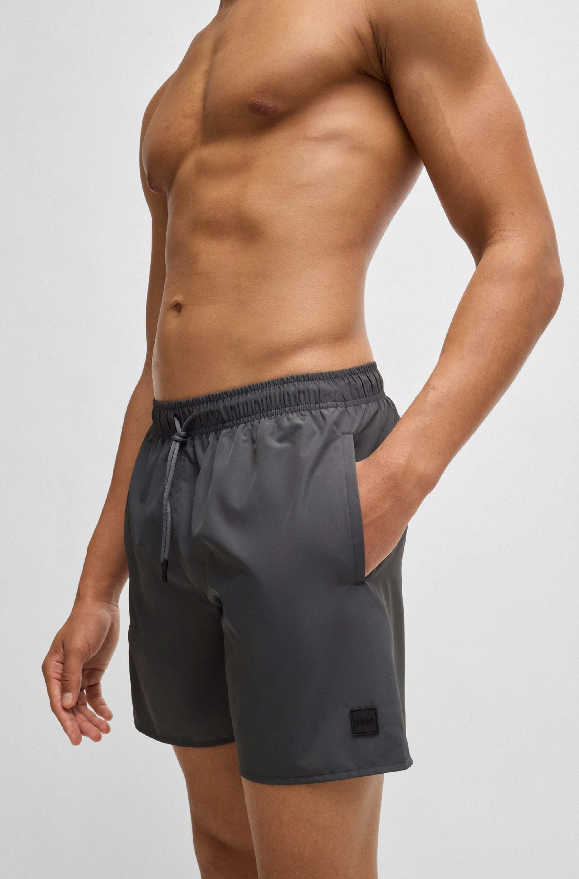 Cargo-pocket swim shorts with logo badge