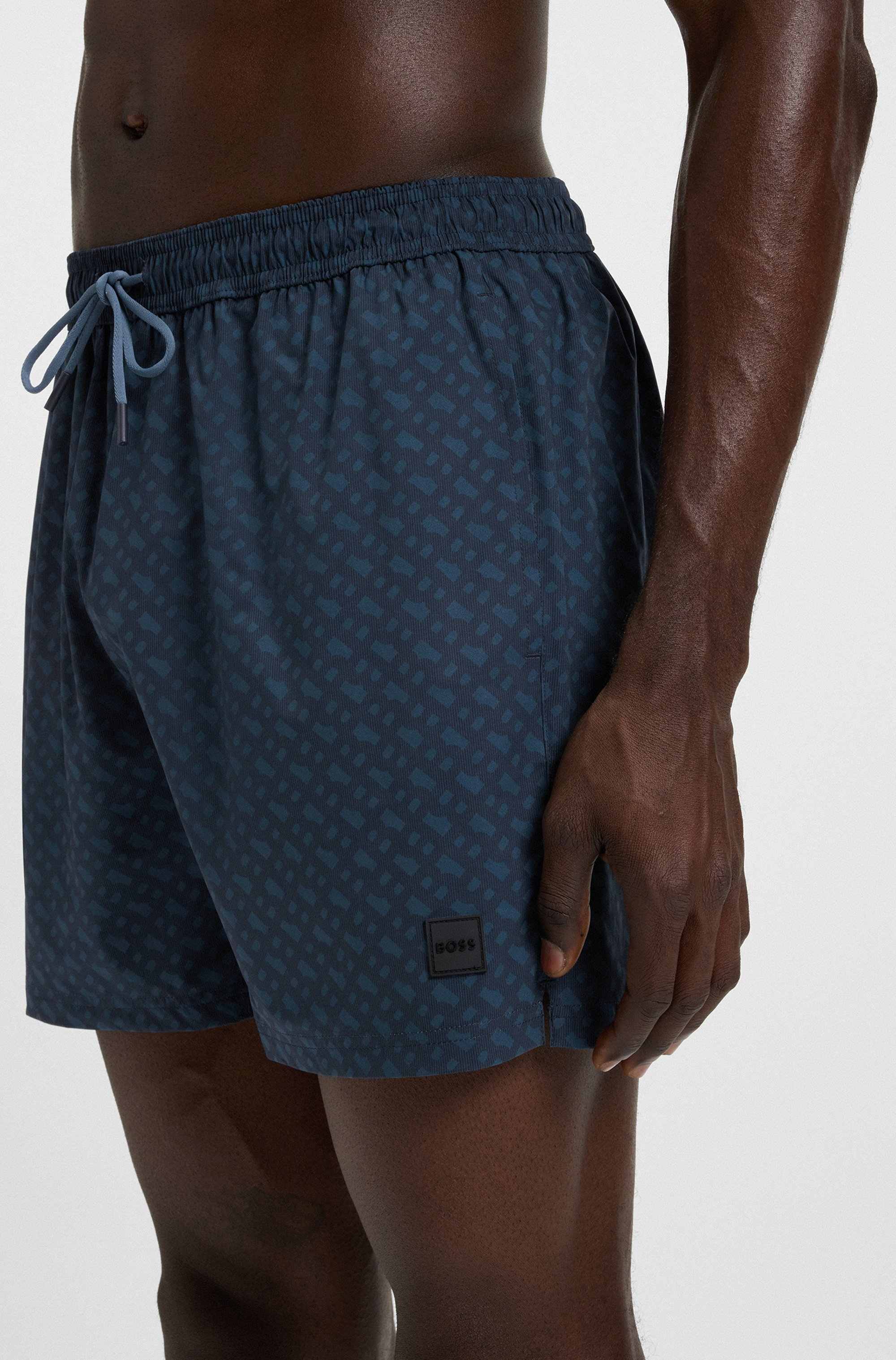 Logo-badge swim shorts with degradé monogram print