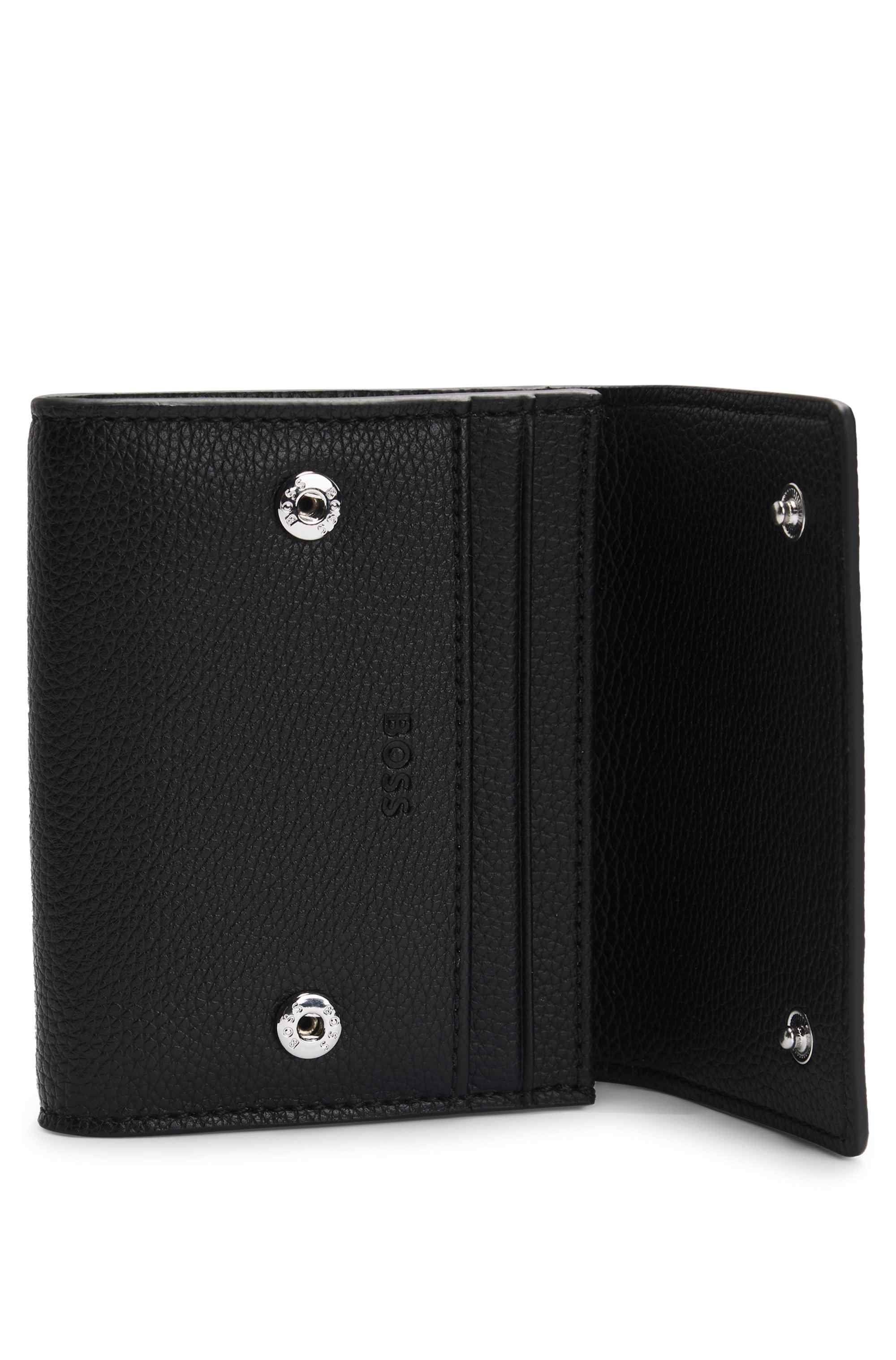 Faux-leather folding card holder with embossed logo