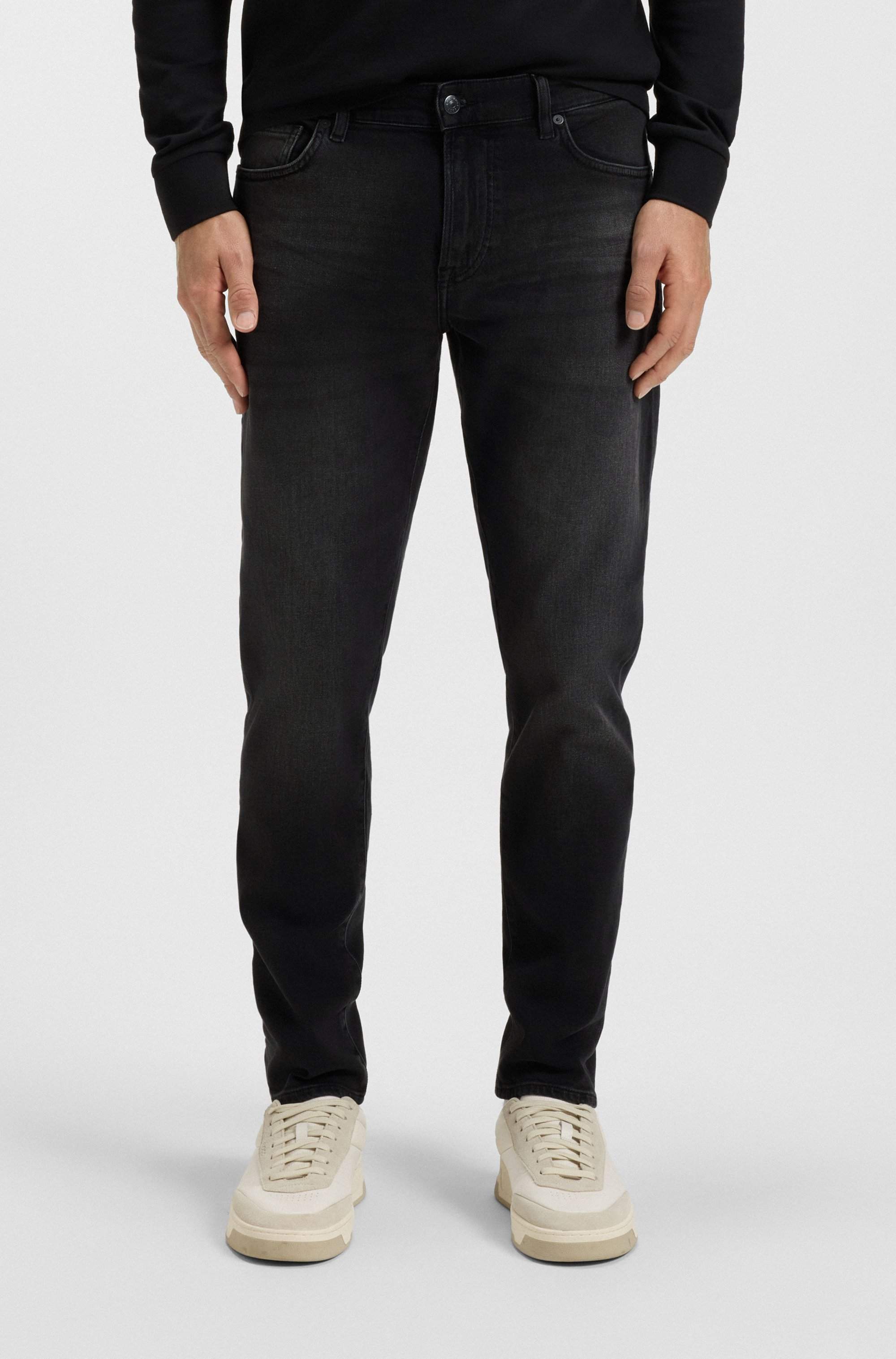 Tapered-fit jeans in black comfort-stretch denim