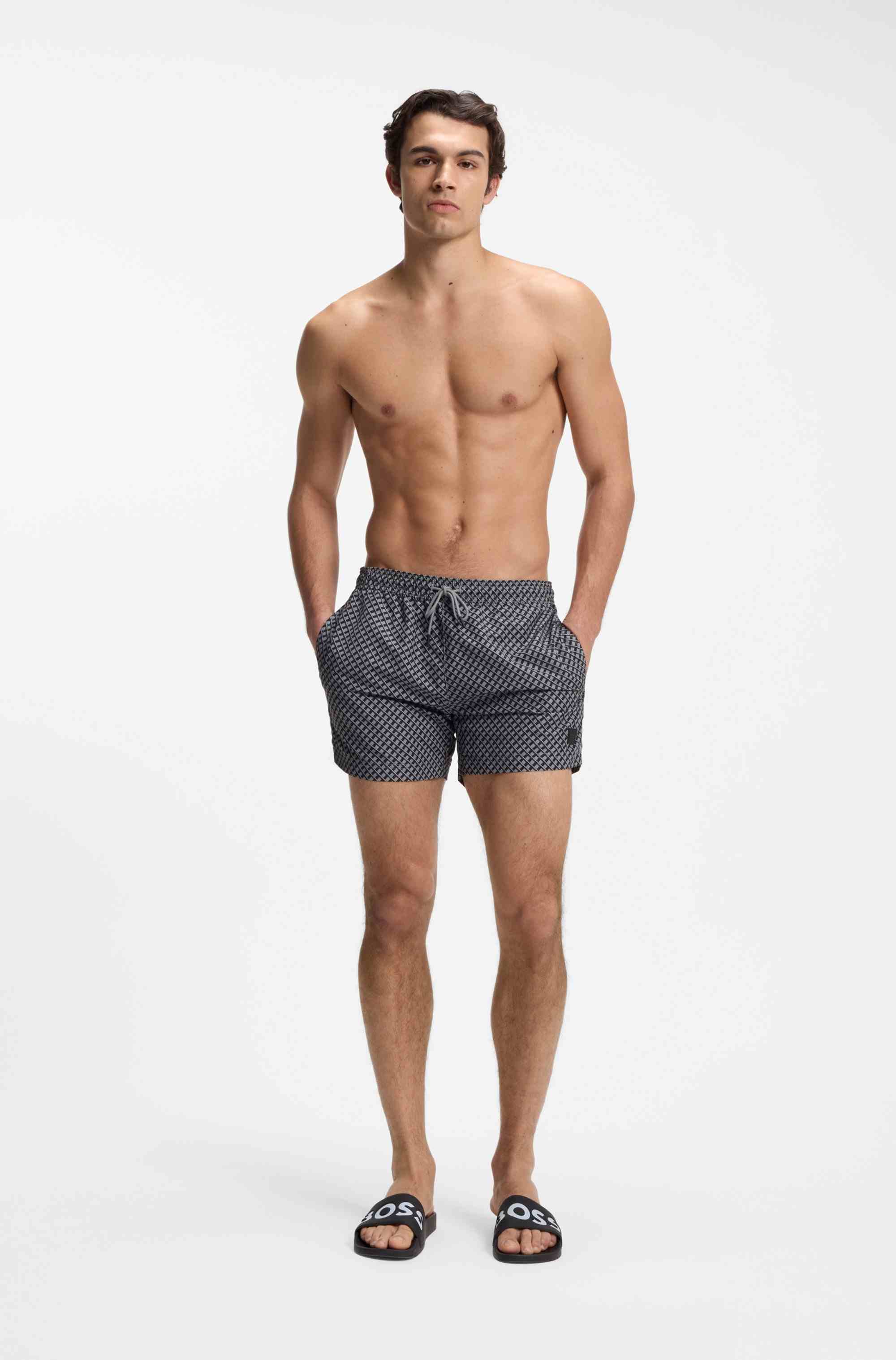 Italian-made slides with large logo detail