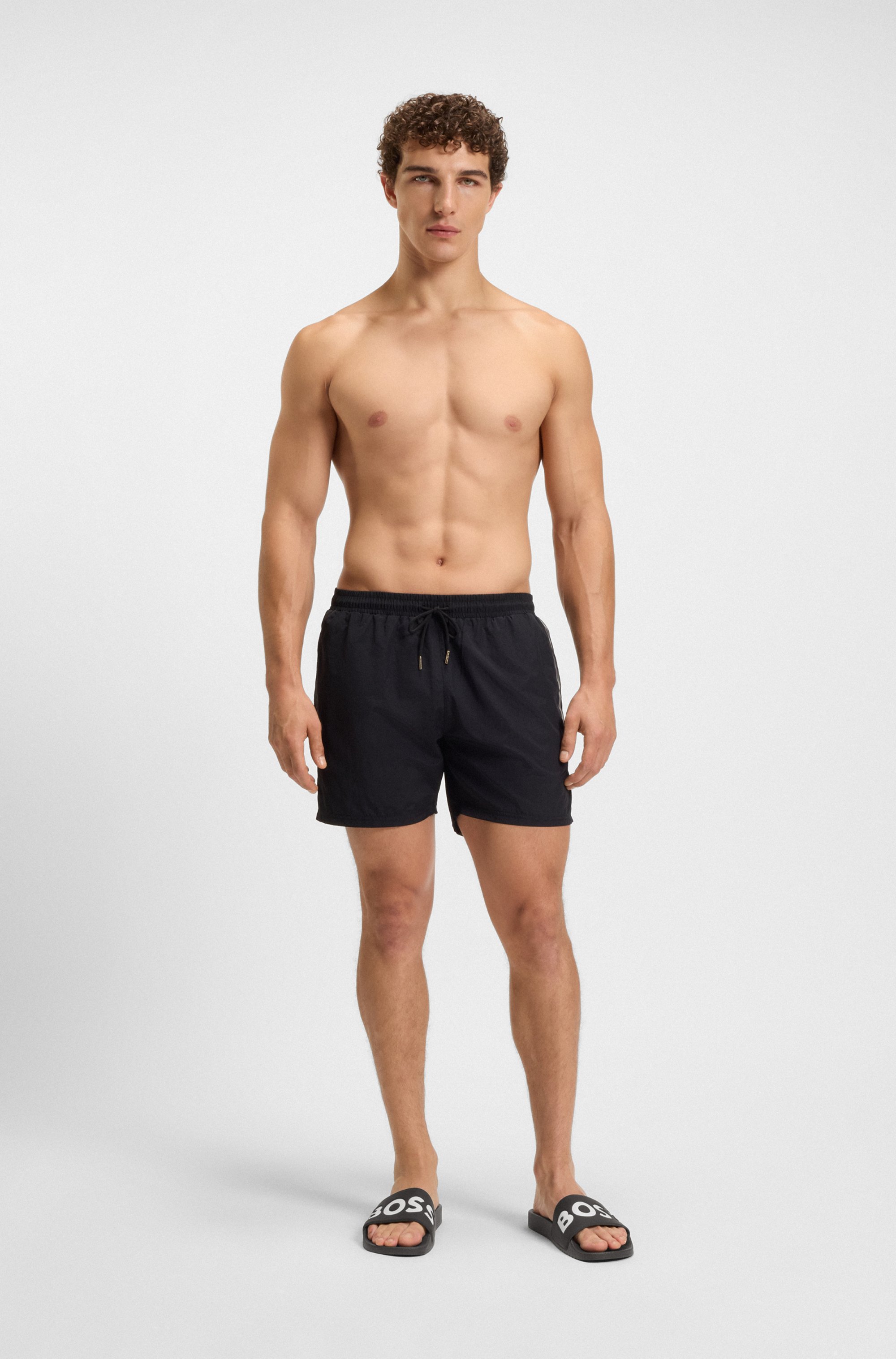 Italian-made slides with large logo detail