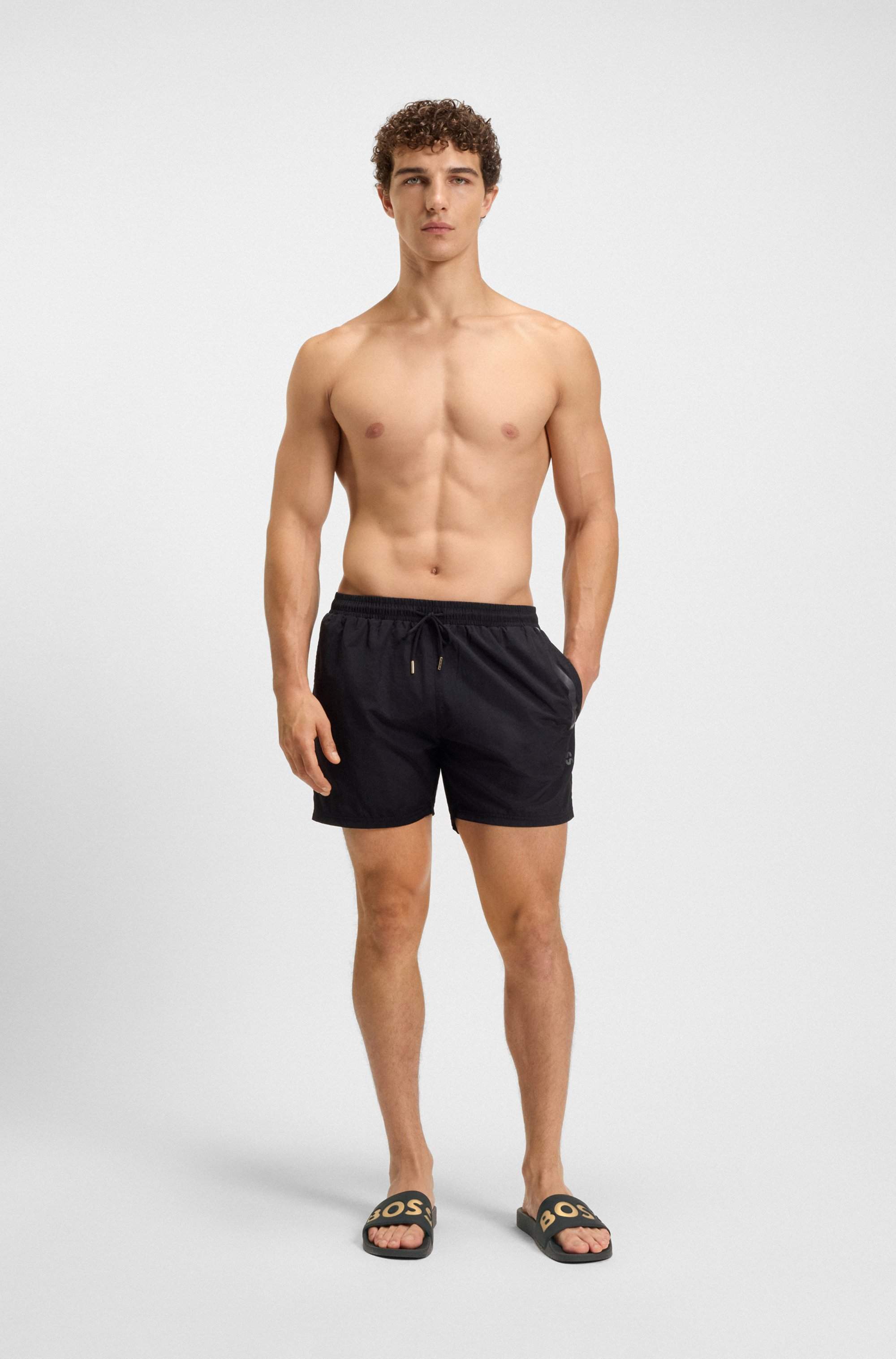 Italian-made slides with large logo detail