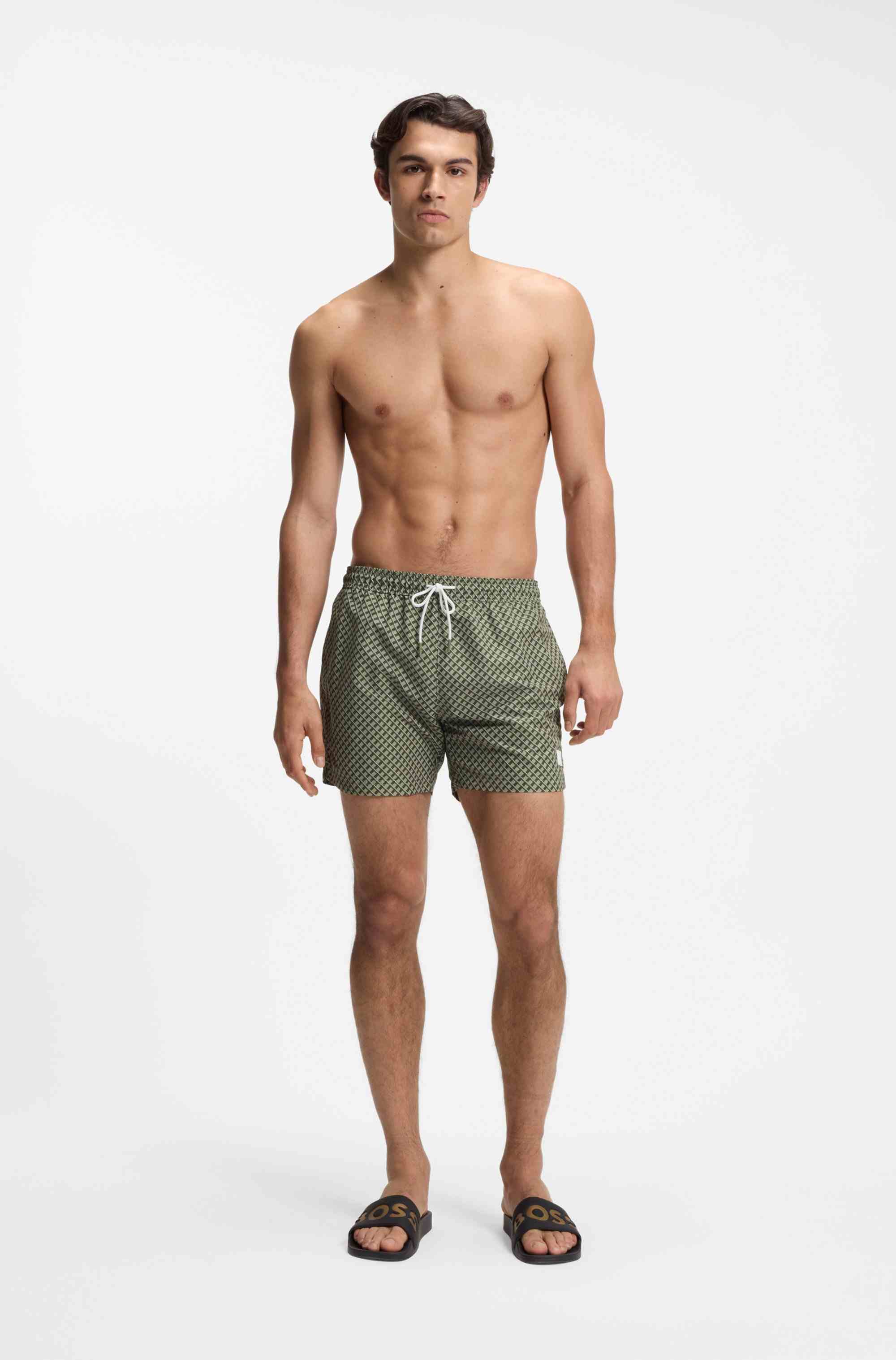 Italian-made slides with large logo detail