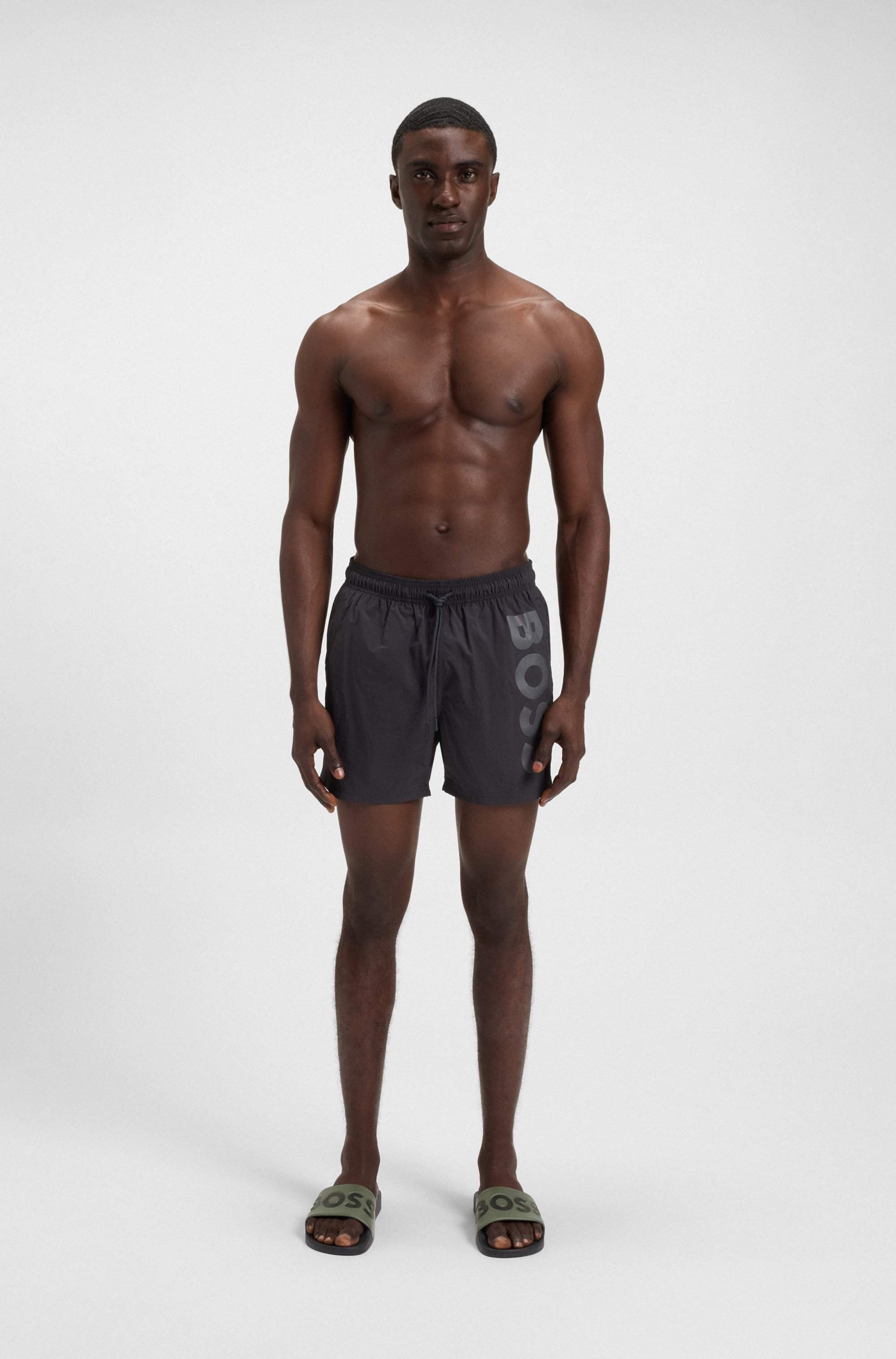 Italian-made slides with large logo detail