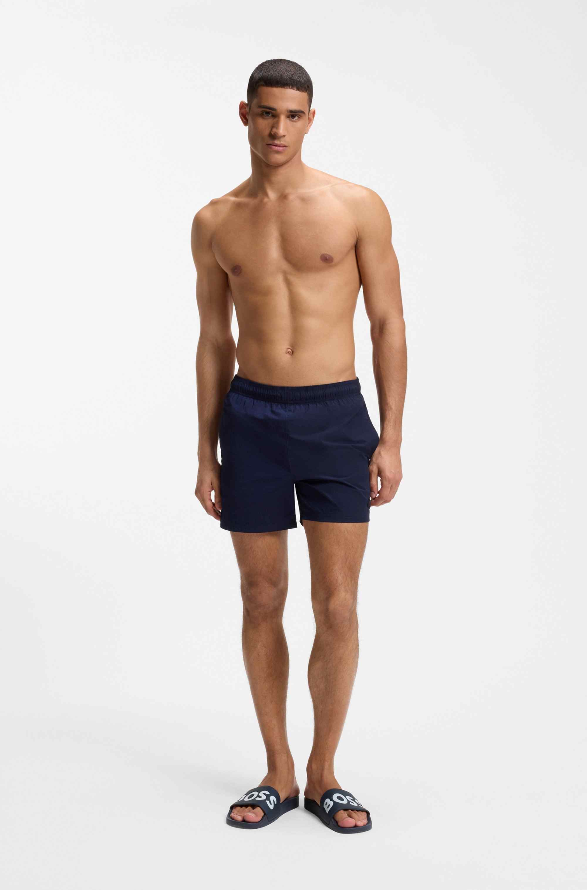 Italian-made slides with large logo detail