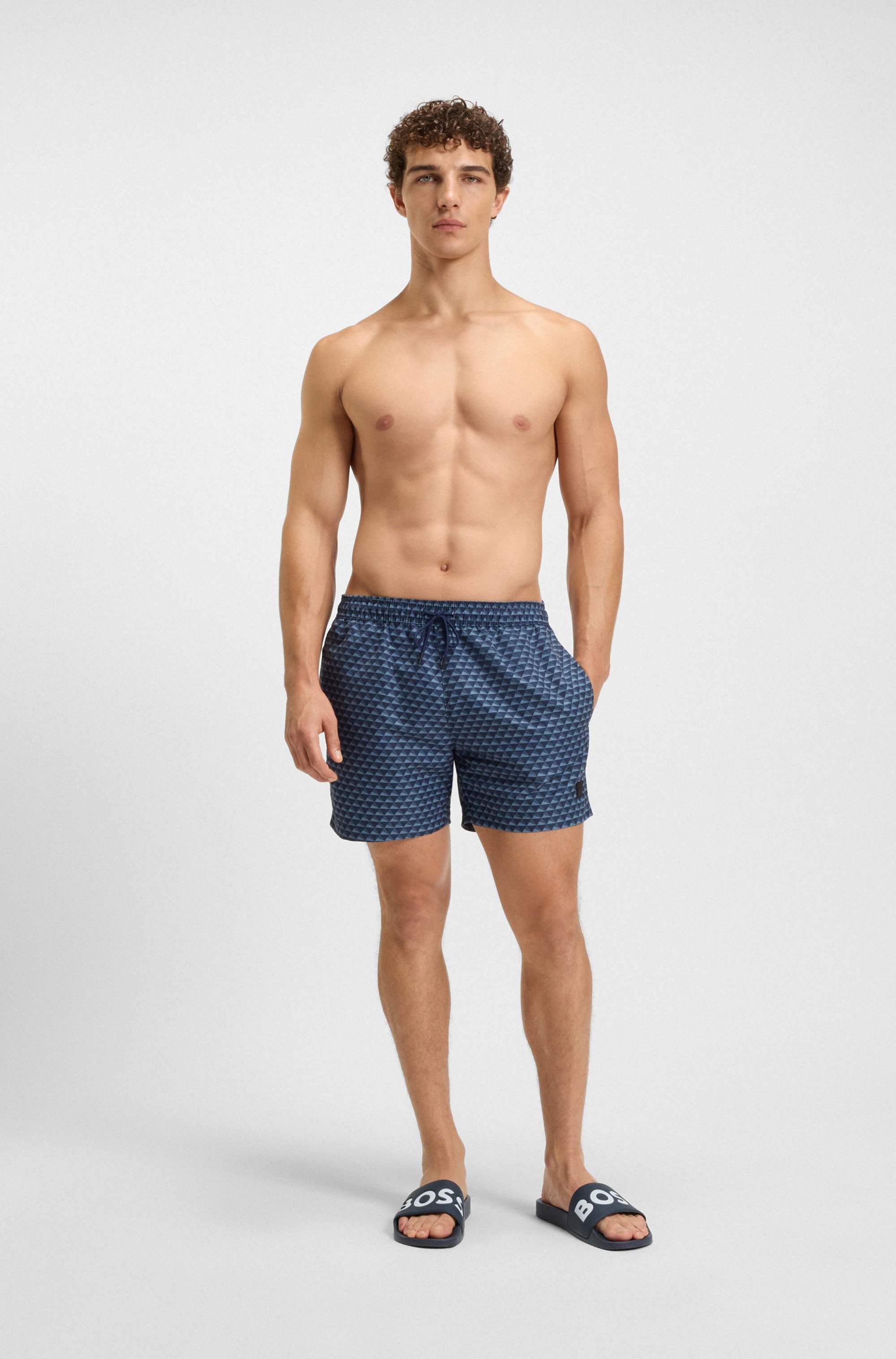 Italian-made slides with large logo detail