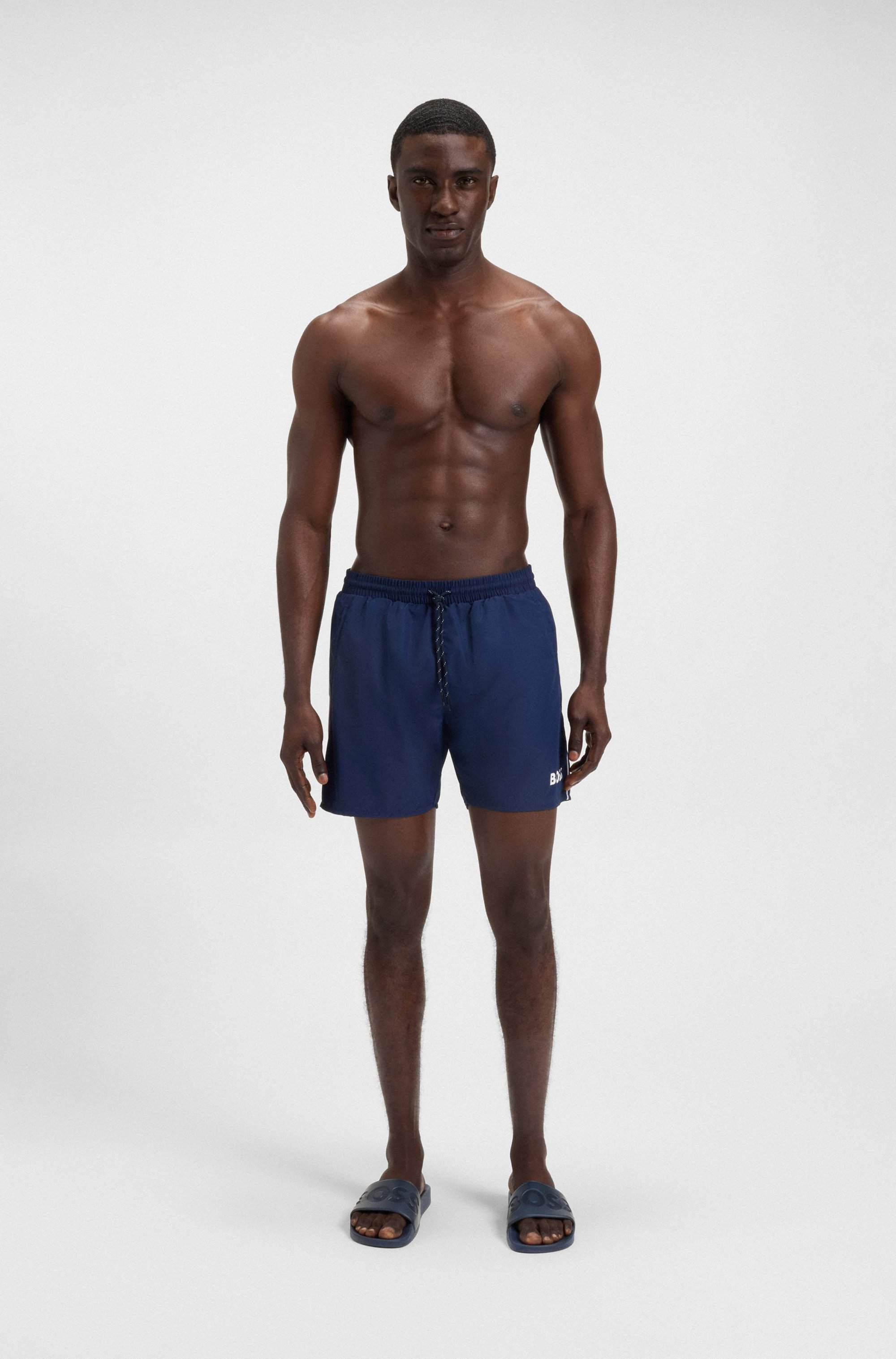 Italian-made slides with large logo detail