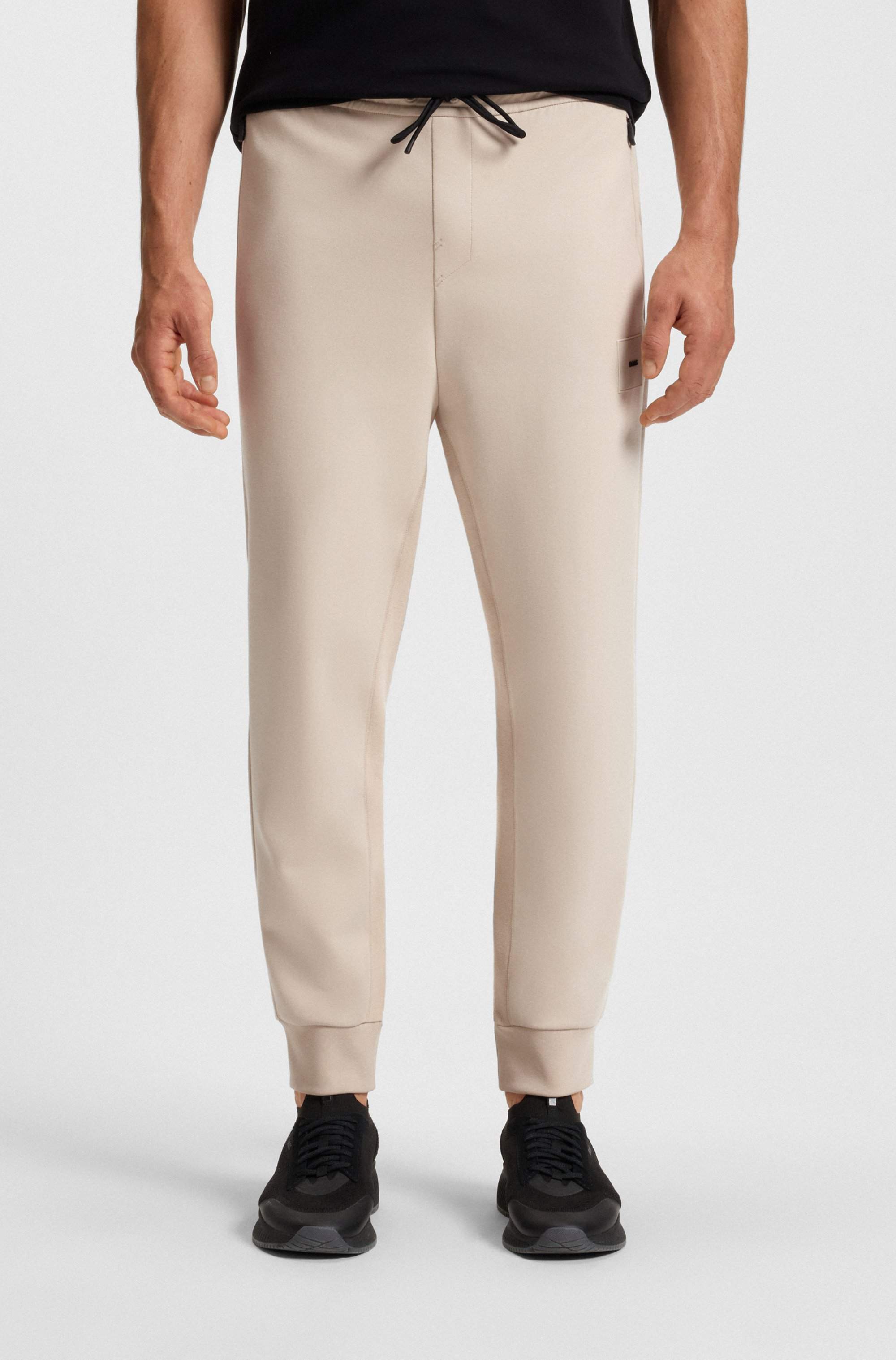 Stretch-cotton-blend tracksuit bottoms with logo patch