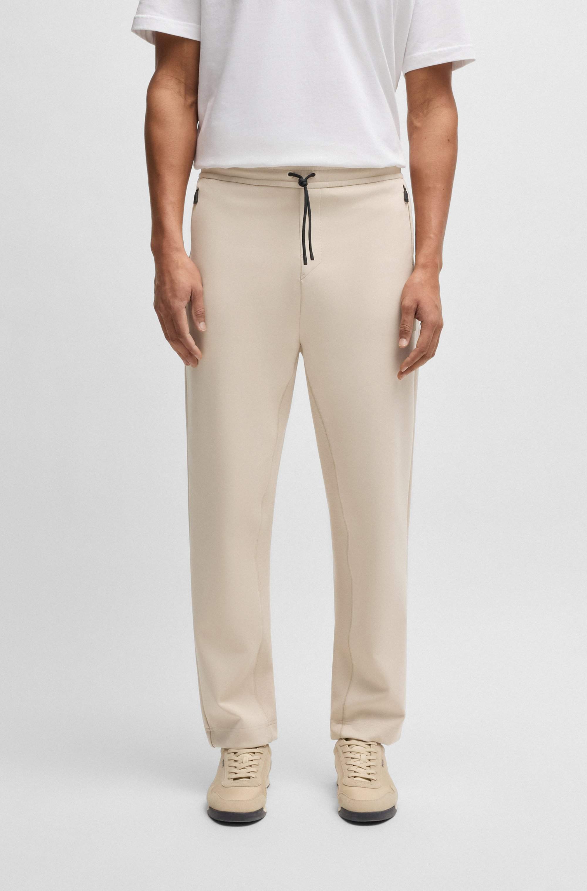 Cotton-blend tracksuit bottoms with stretch
