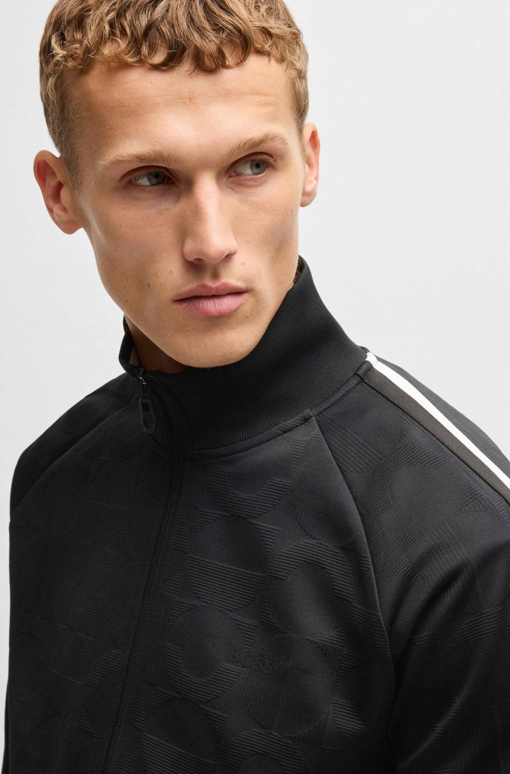 Circle-jacquard zip-up sweatshirt with side stripes