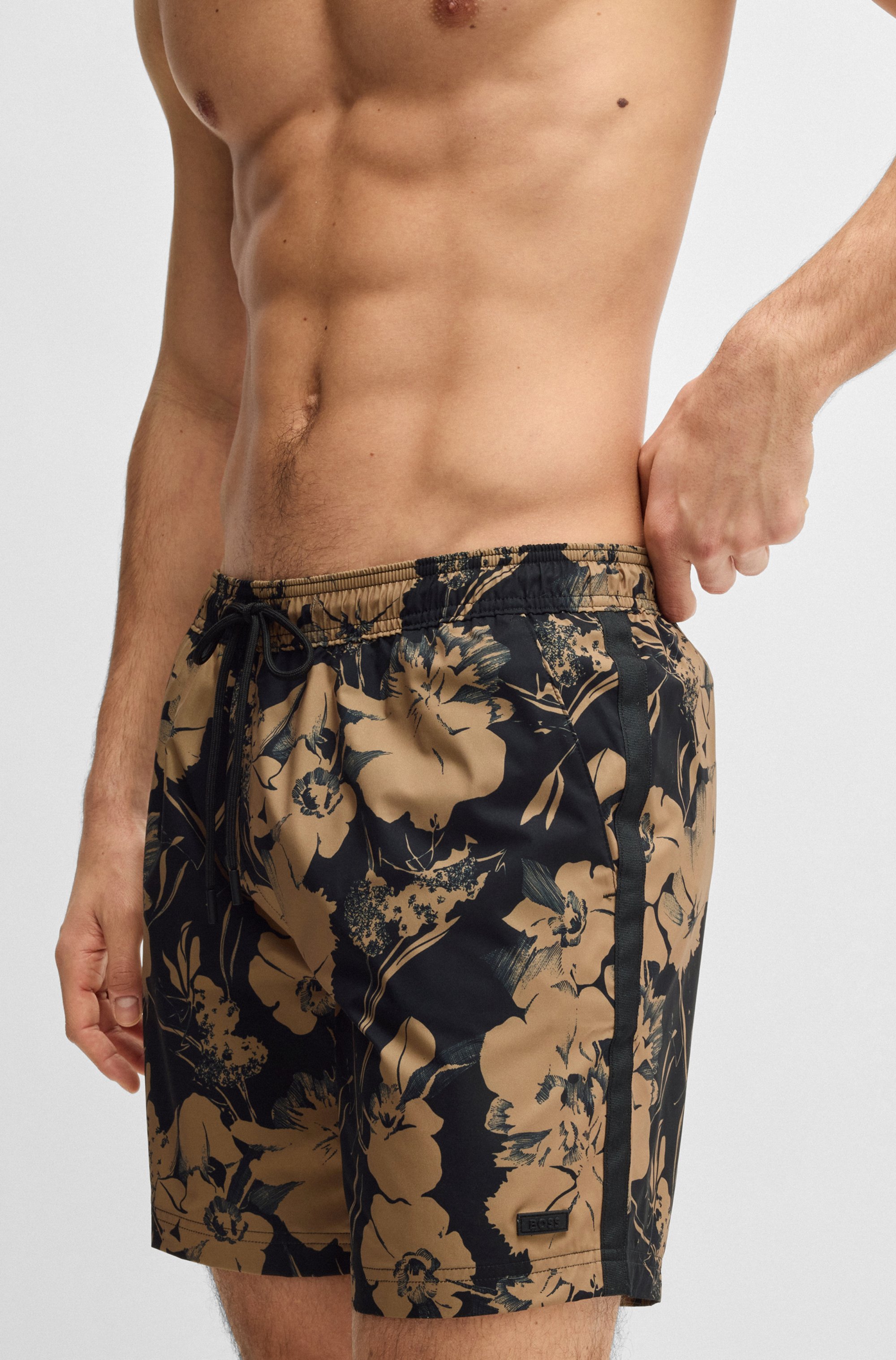 Floral-print swim shorts with side stripe