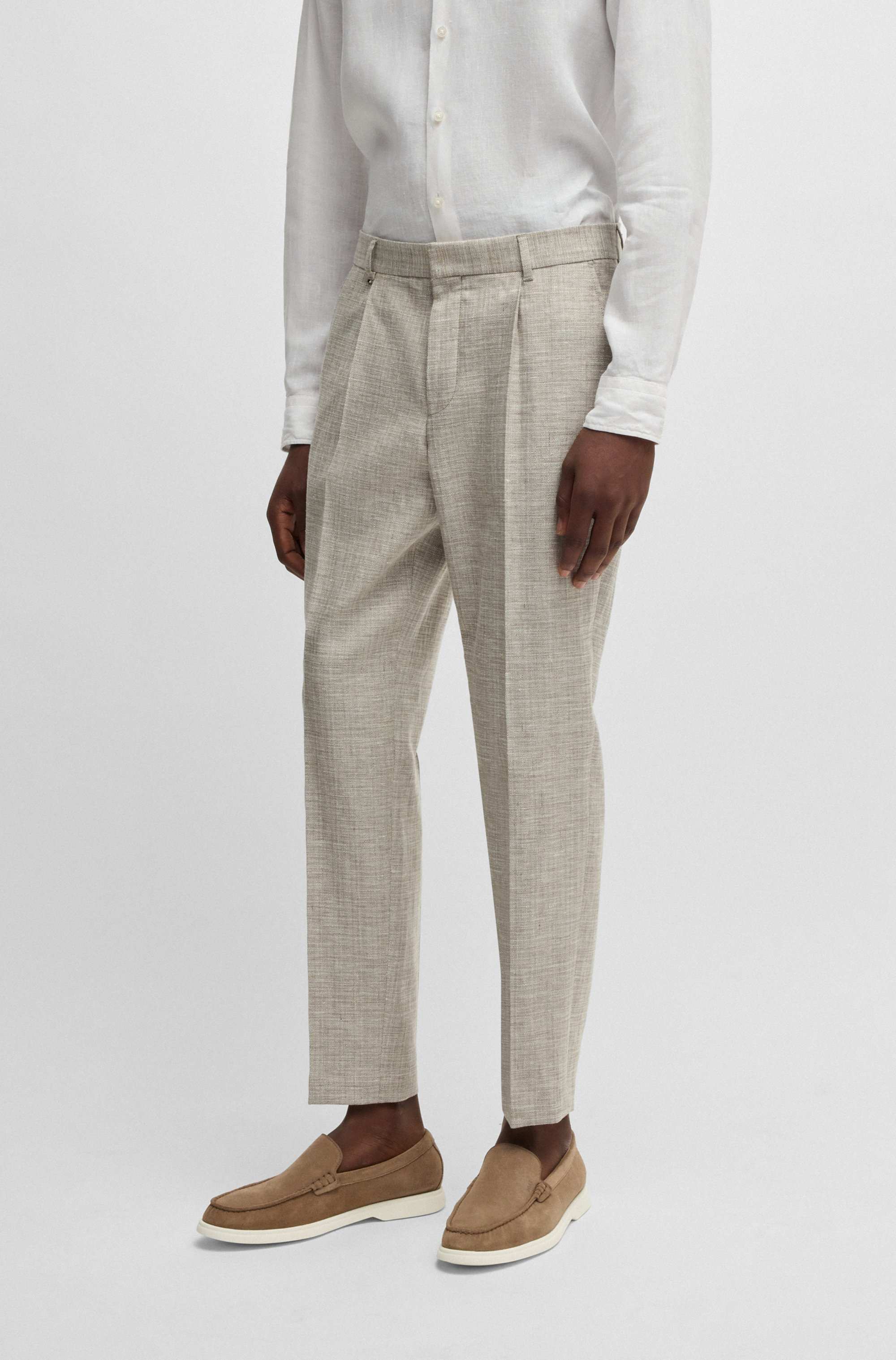 Formal trousers in micro-patterned stretch fabric