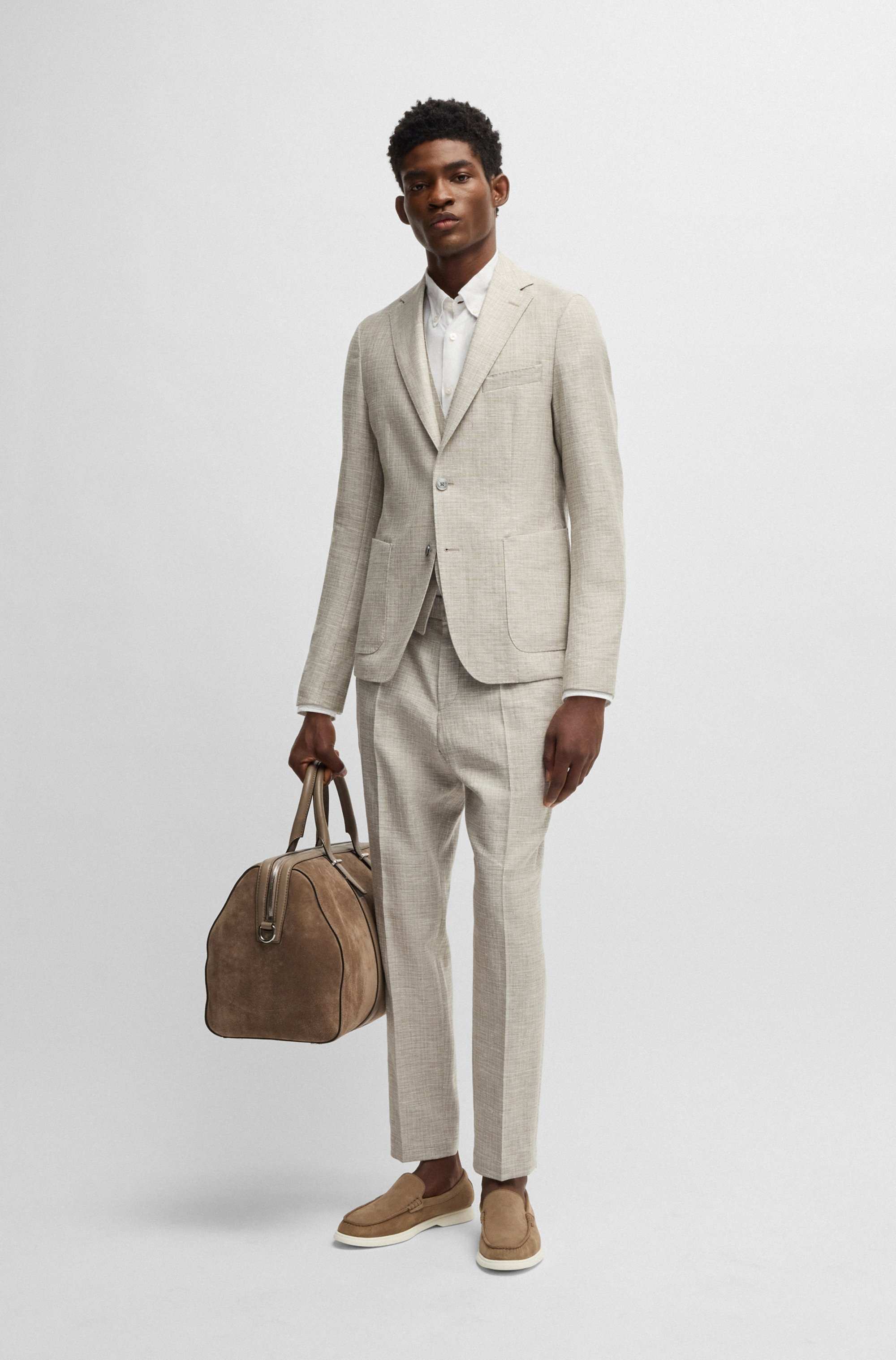 Formal trousers in micro-patterned stretch fabric