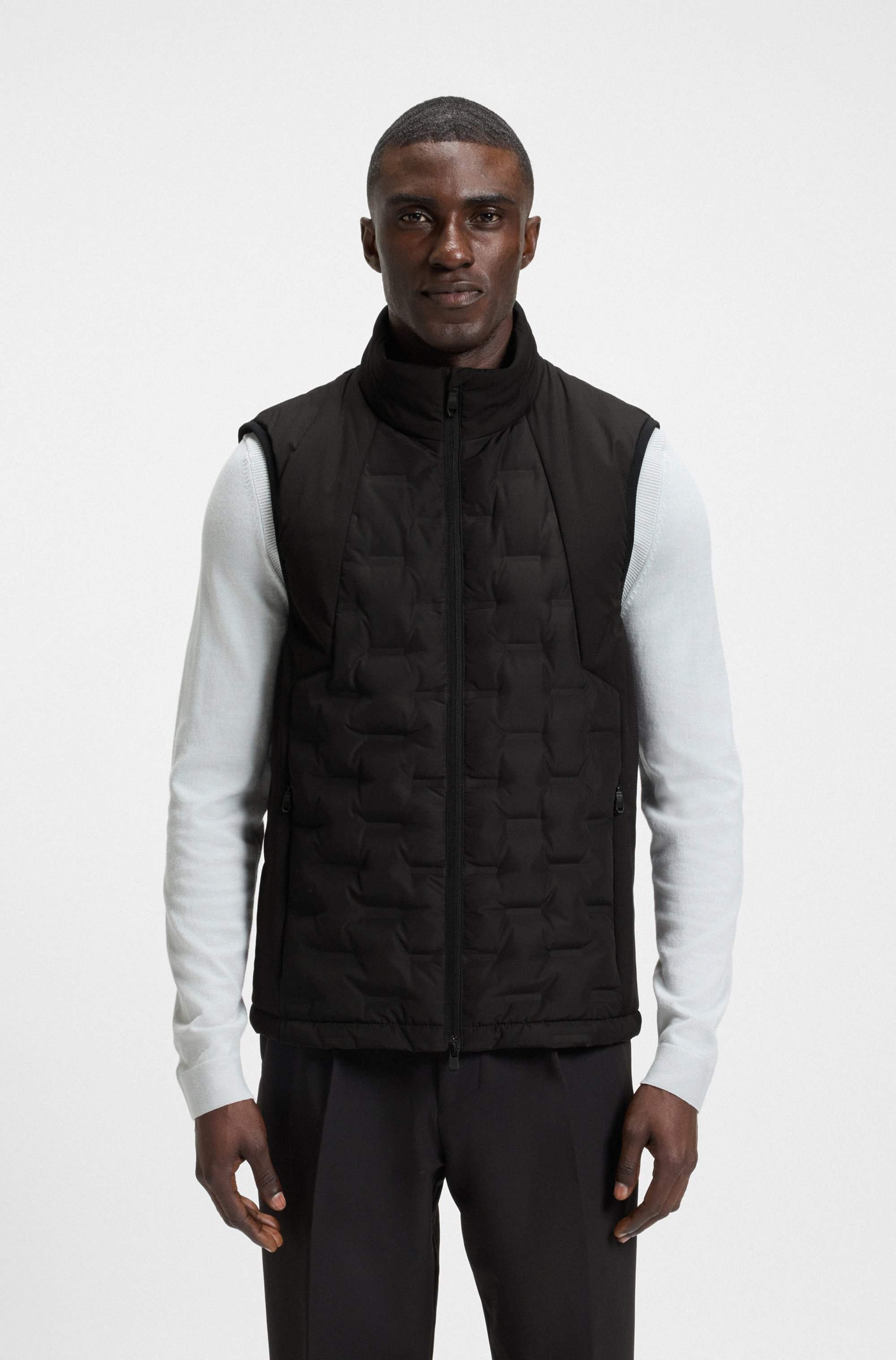 Down-filled gilet with welded-logo pattern