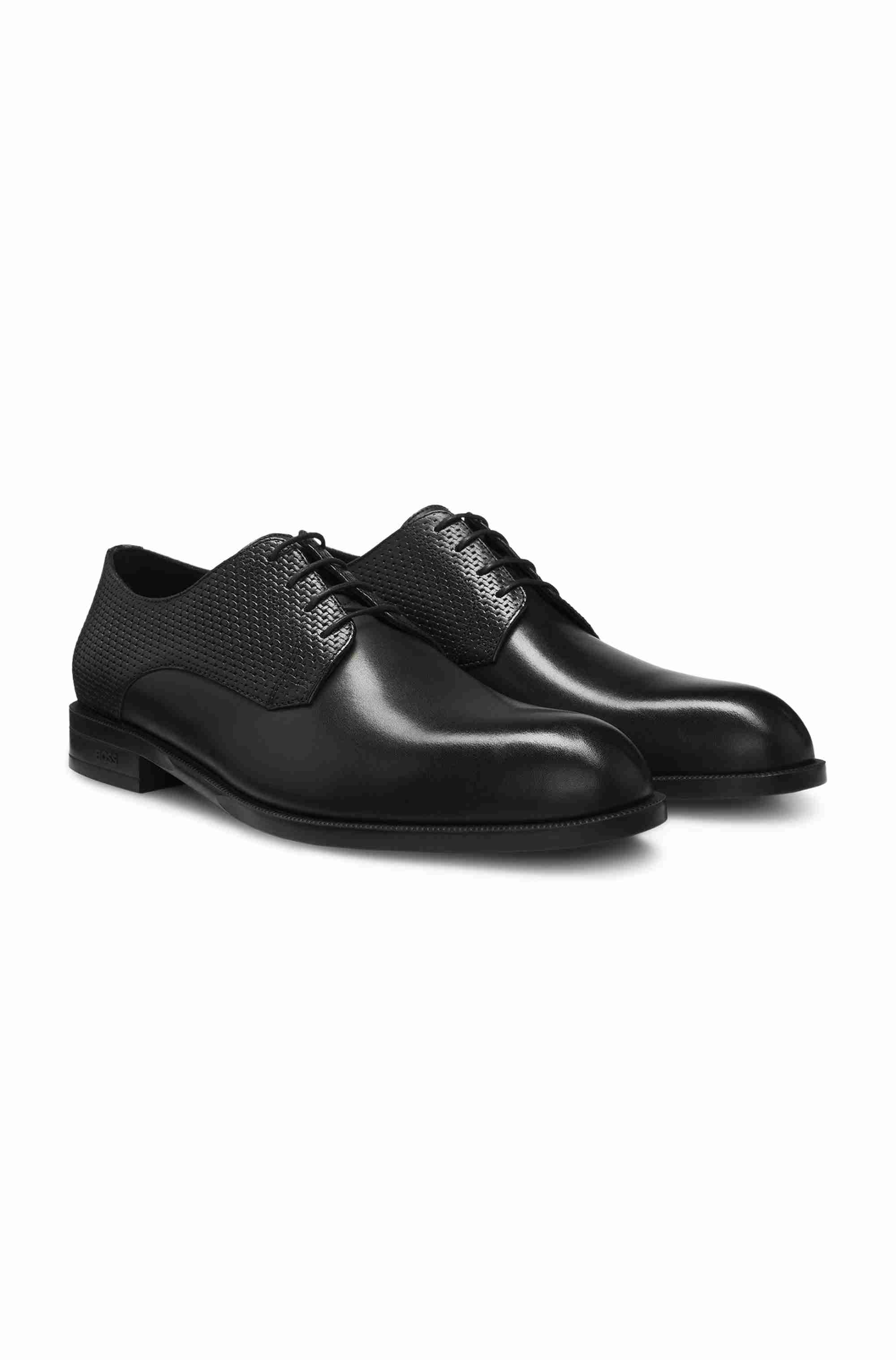 Derby shoes in printed and smooth leather