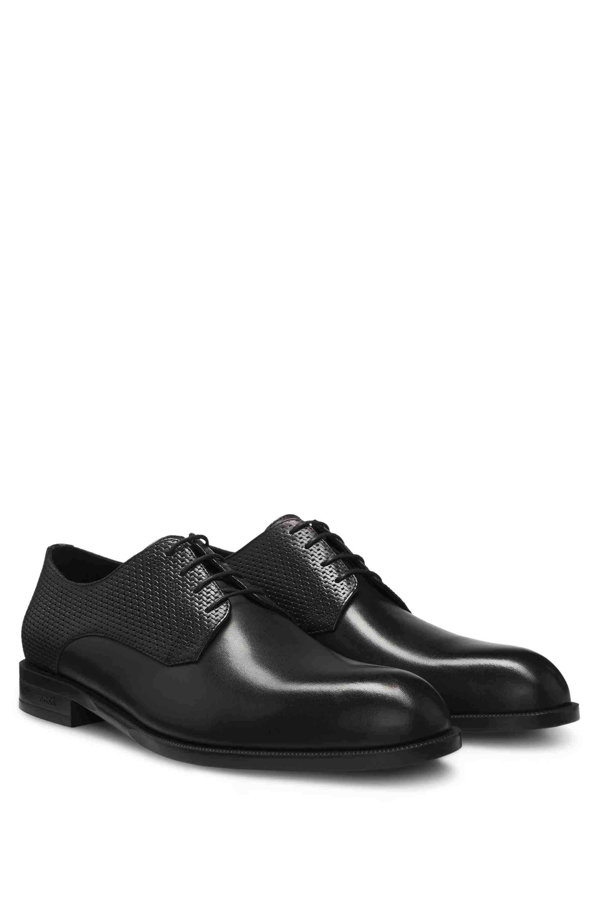 Derby shoes in printed and smooth leather