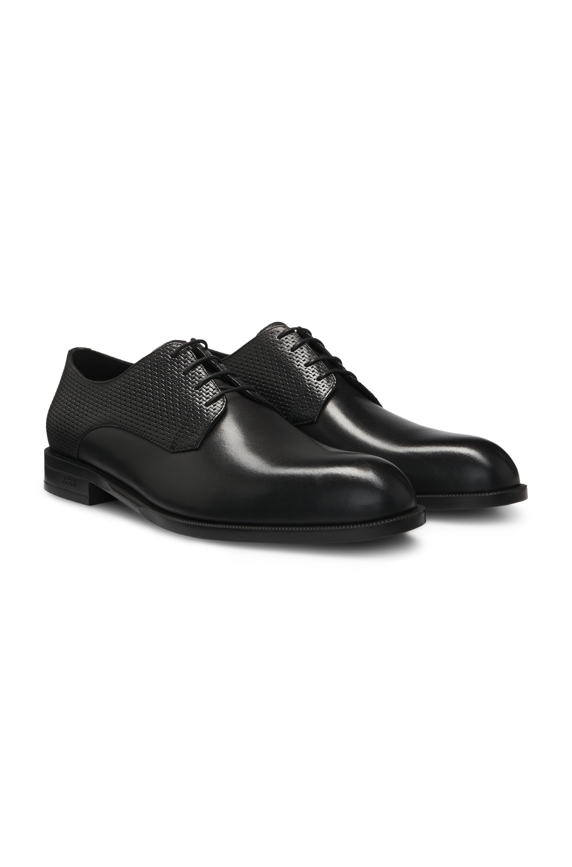 Derby shoes in printed and smooth leather