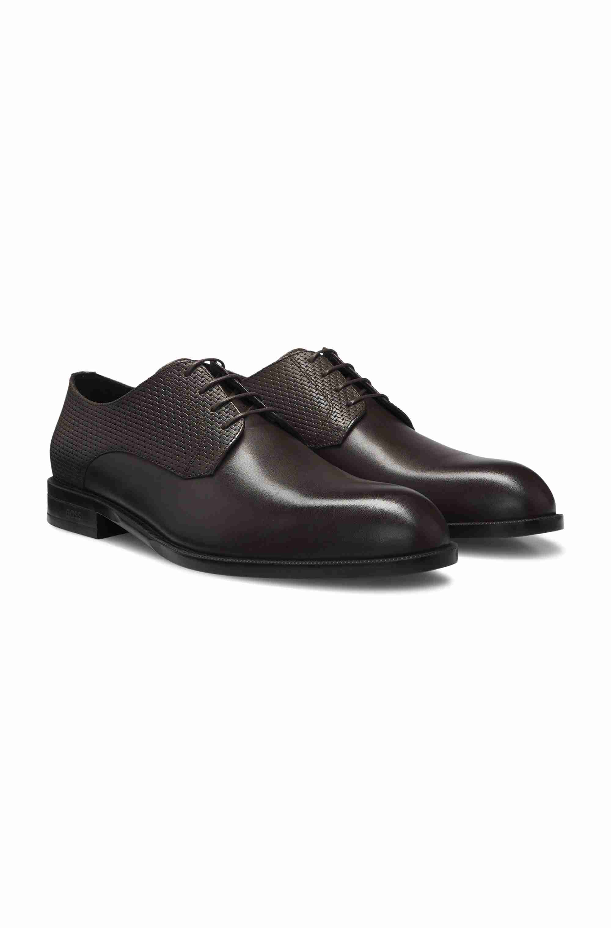 Derby shoes in printed and smooth leather