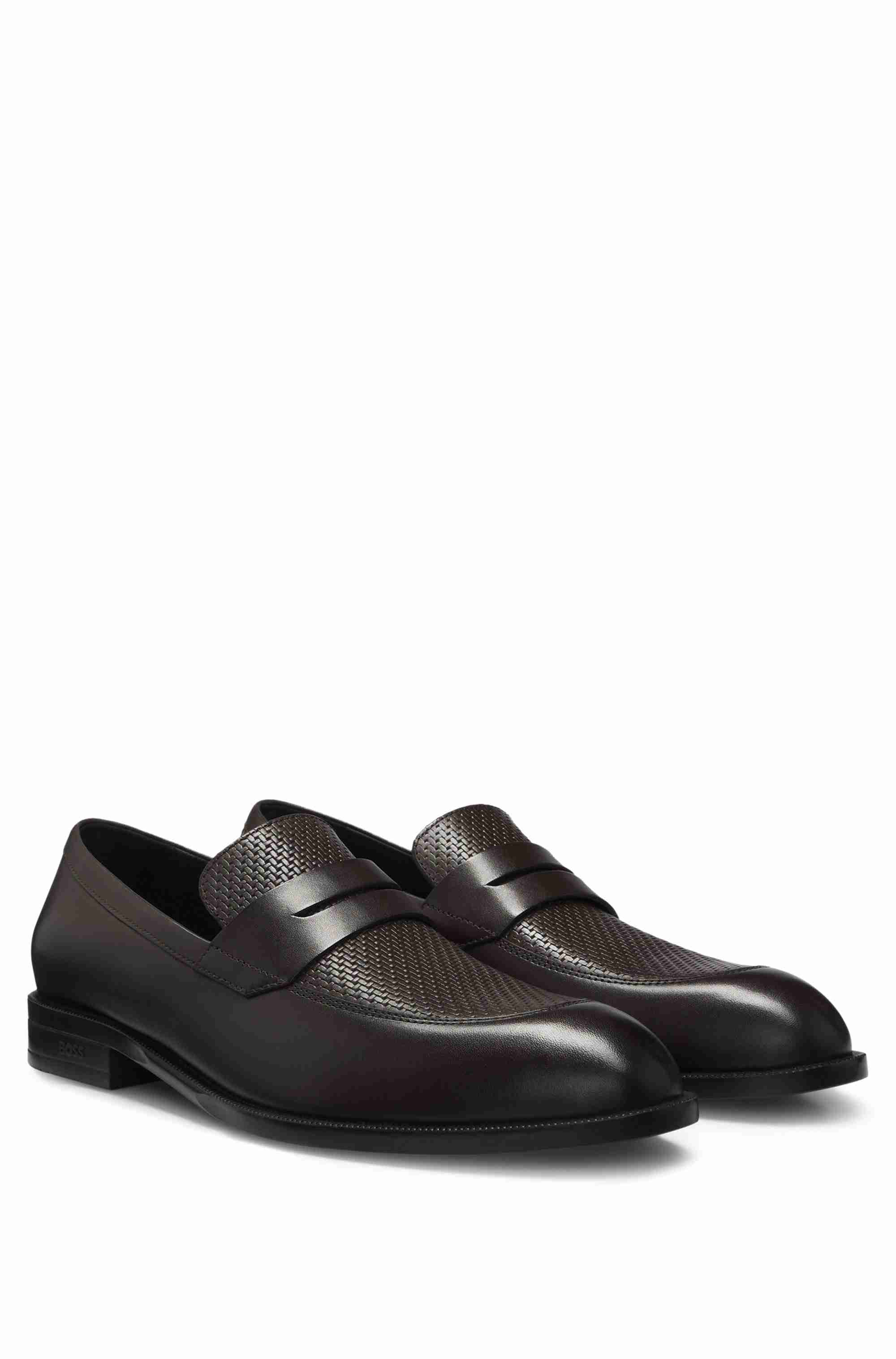 Penny loafers in printed and smooth leather