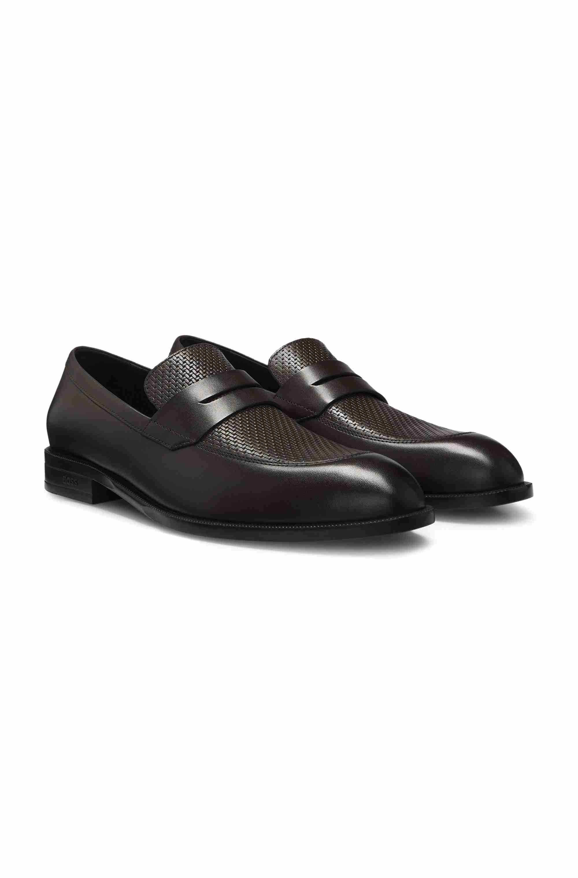 Penny loafers in printed and smooth leather