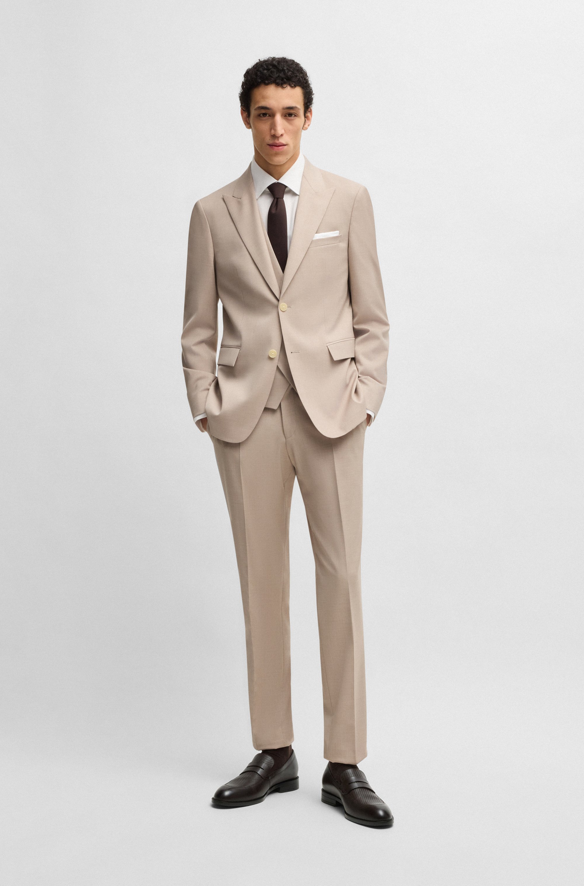 Penny loafers in printed and smooth leather