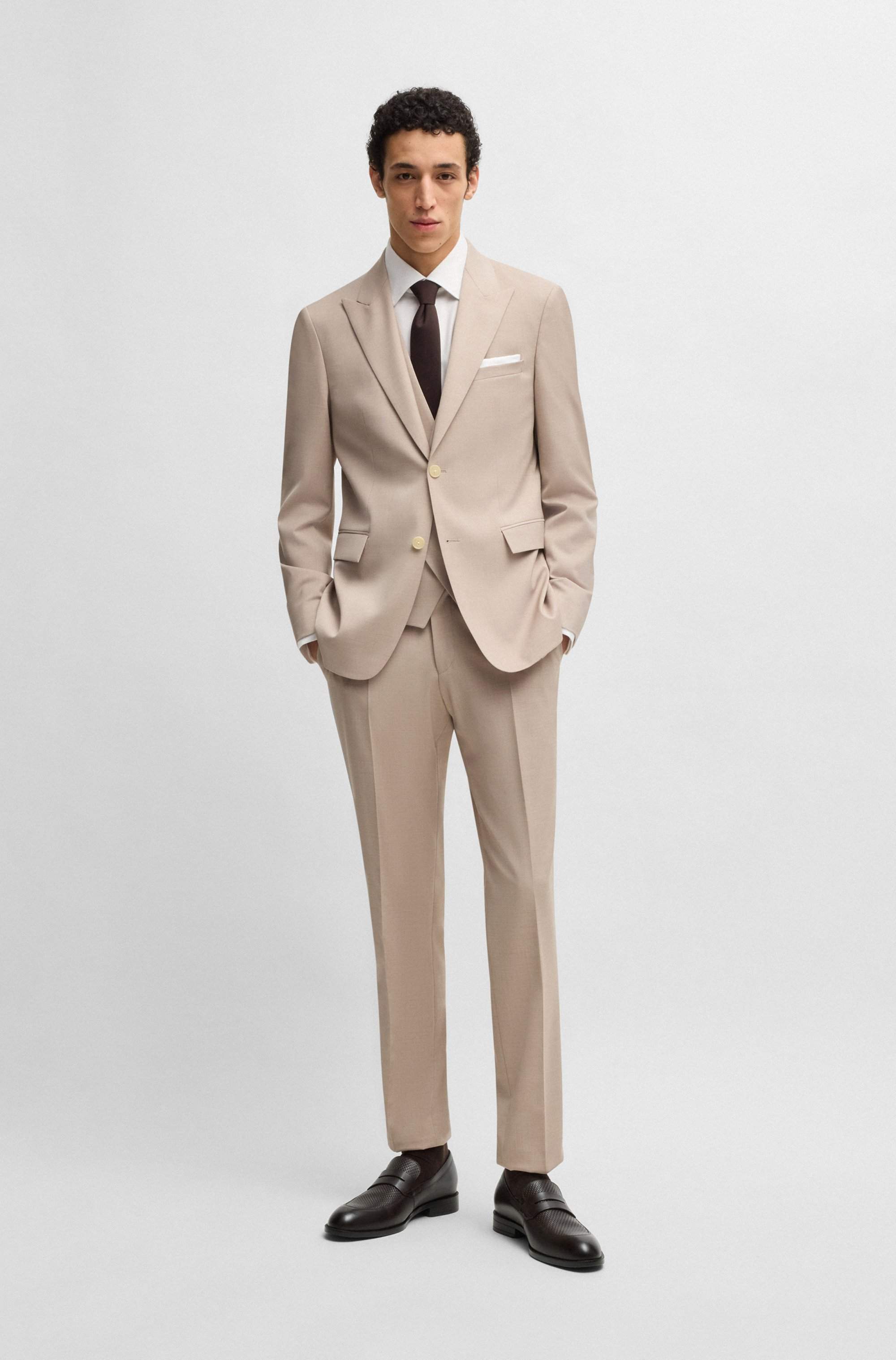 Penny loafers in printed and smooth leather