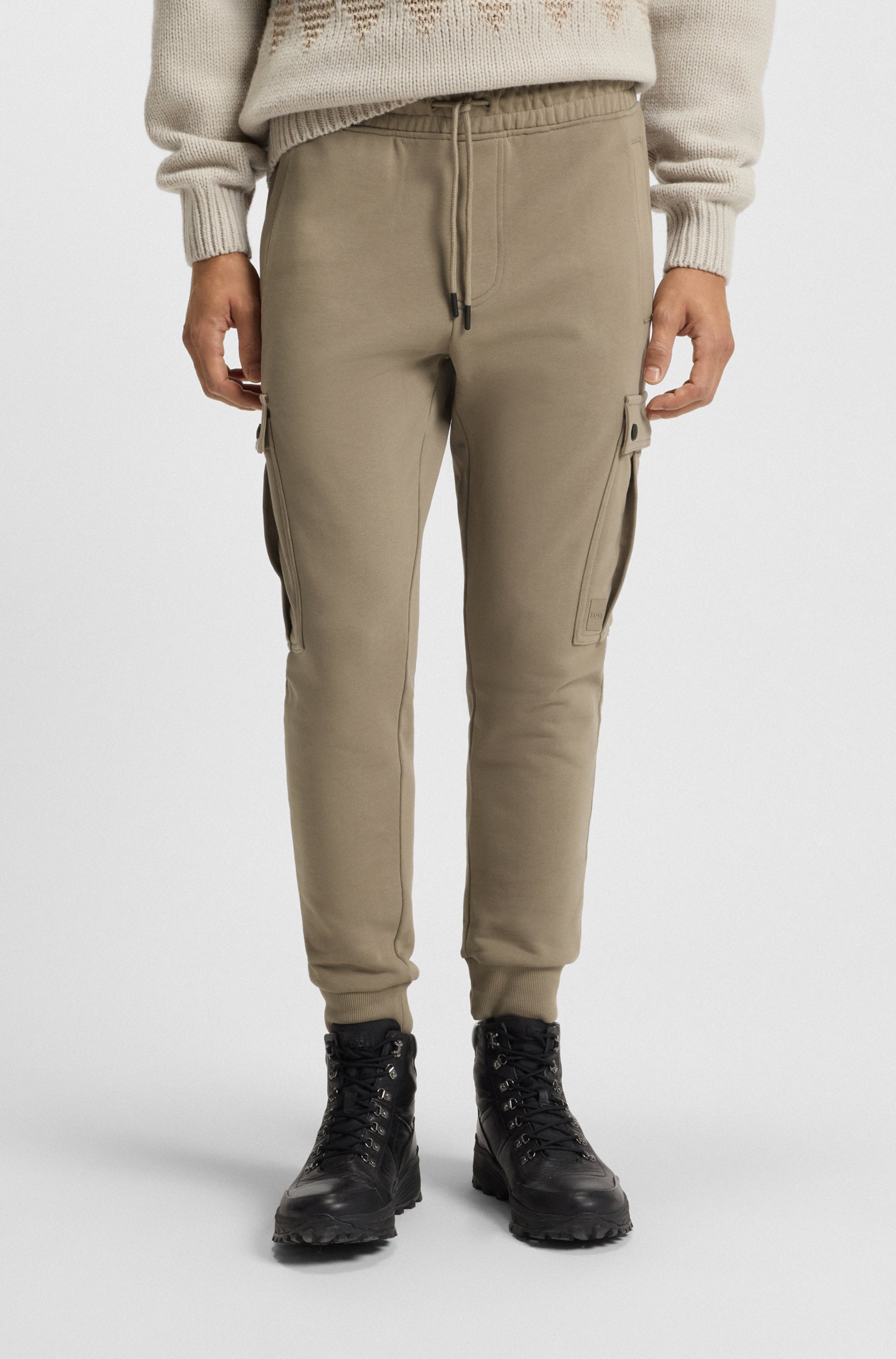 Relaxed-fit cotton-terry tracksuit bottoms with cargo pockets