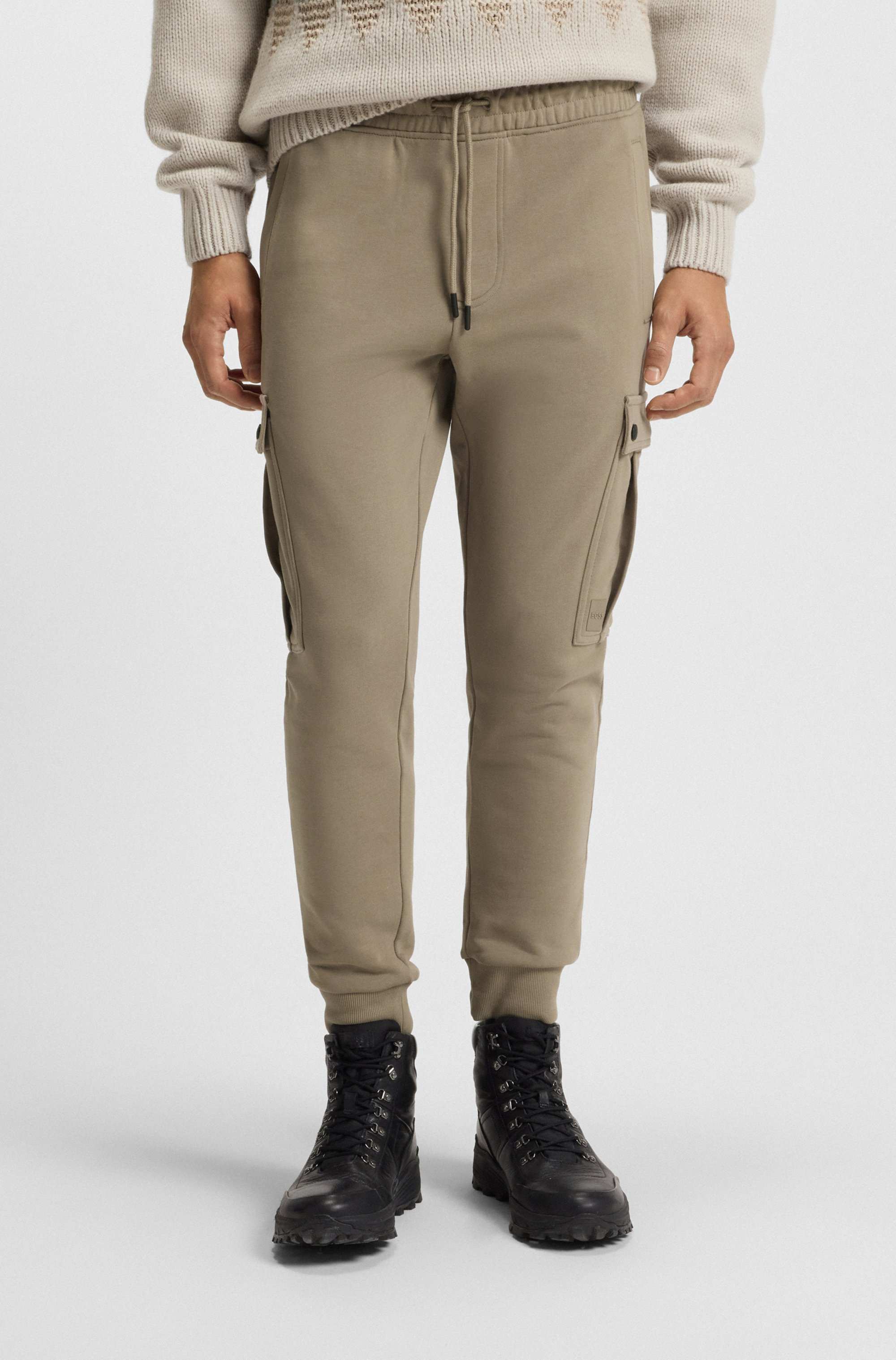 Relaxed-fit cotton-terry tracksuit bottoms with cargo pockets