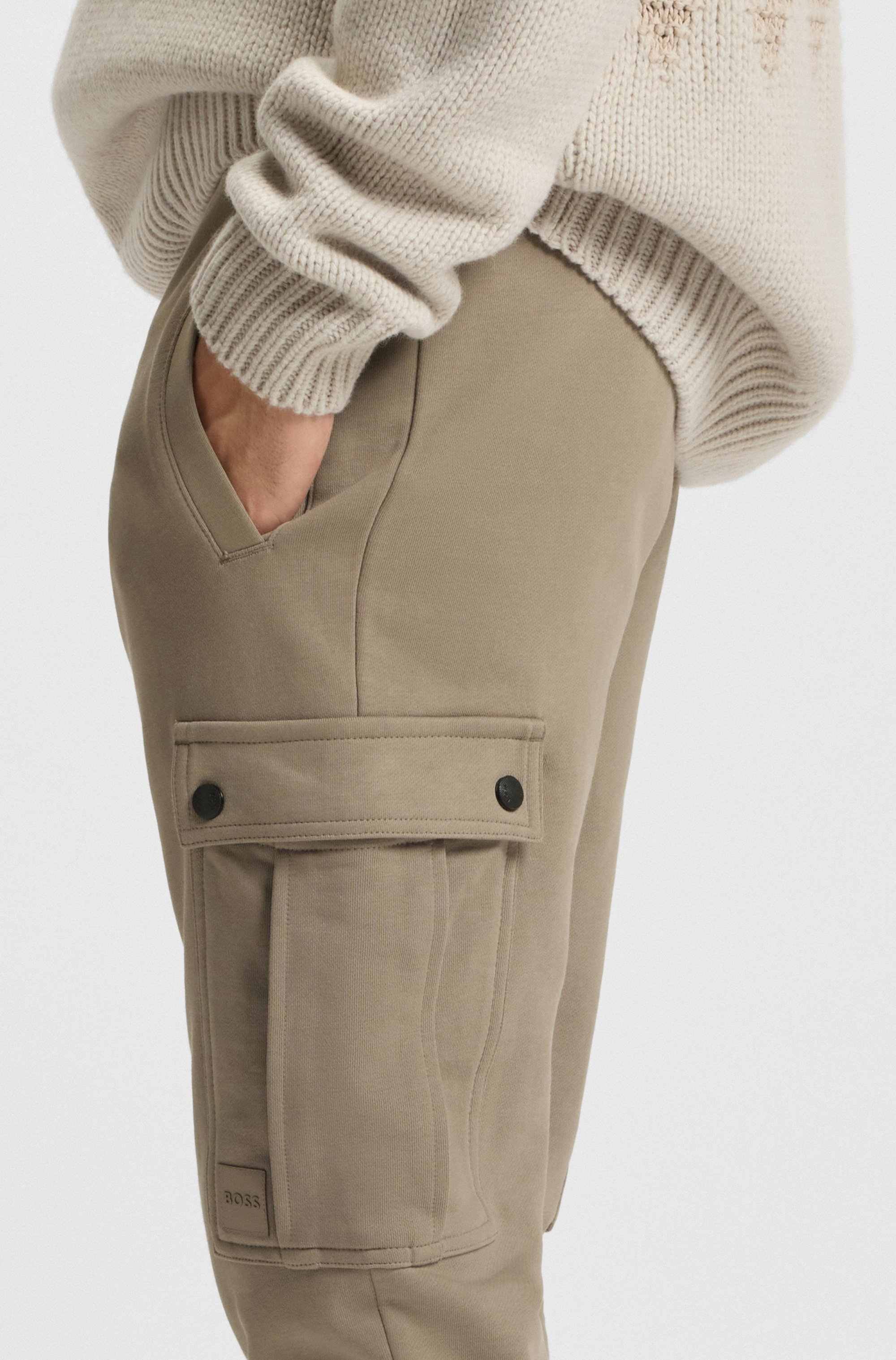 Relaxed-fit cotton-terry tracksuit bottoms with cargo pockets