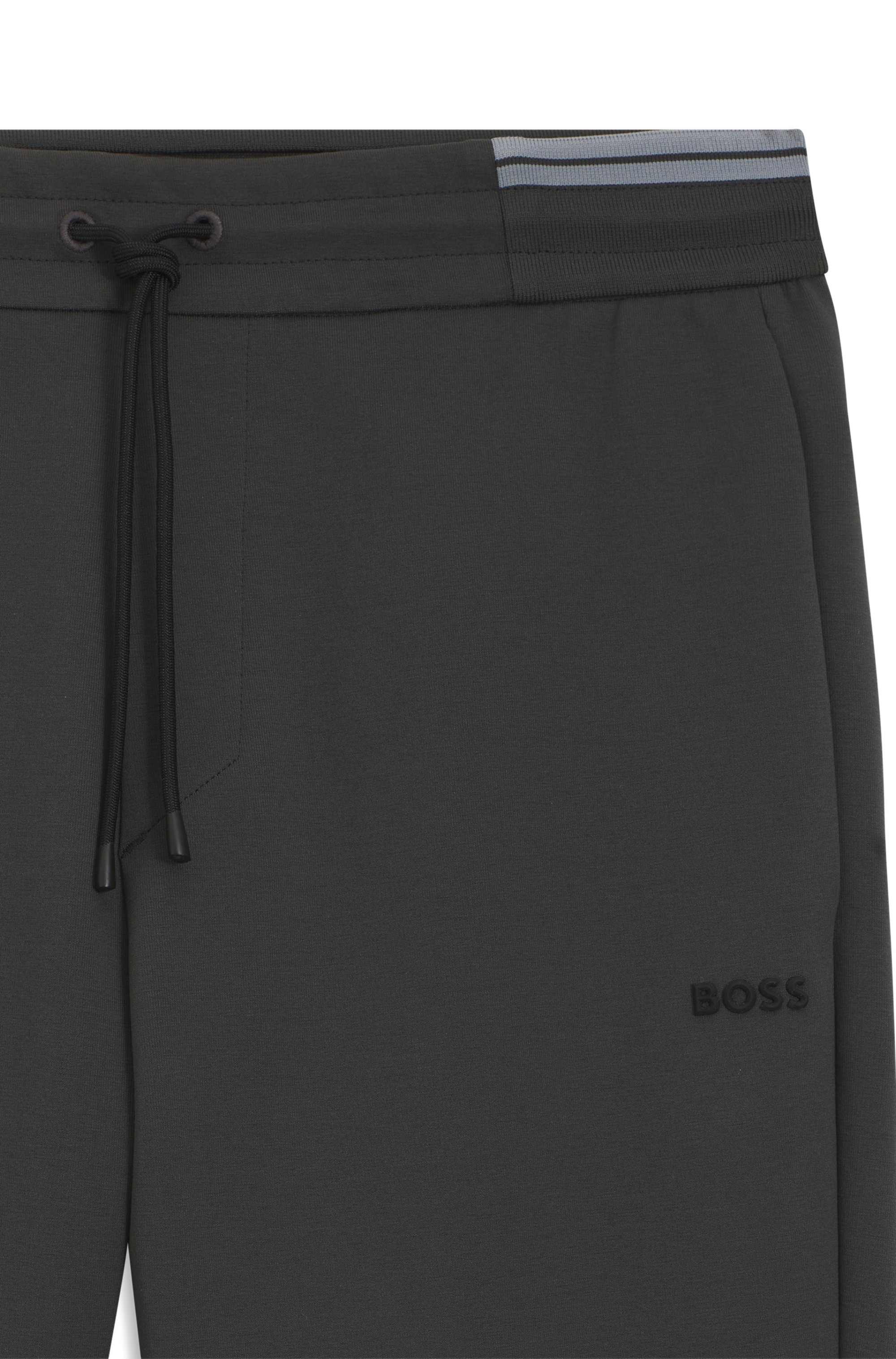 Cotton-blend tracksuit bottoms with striped trims