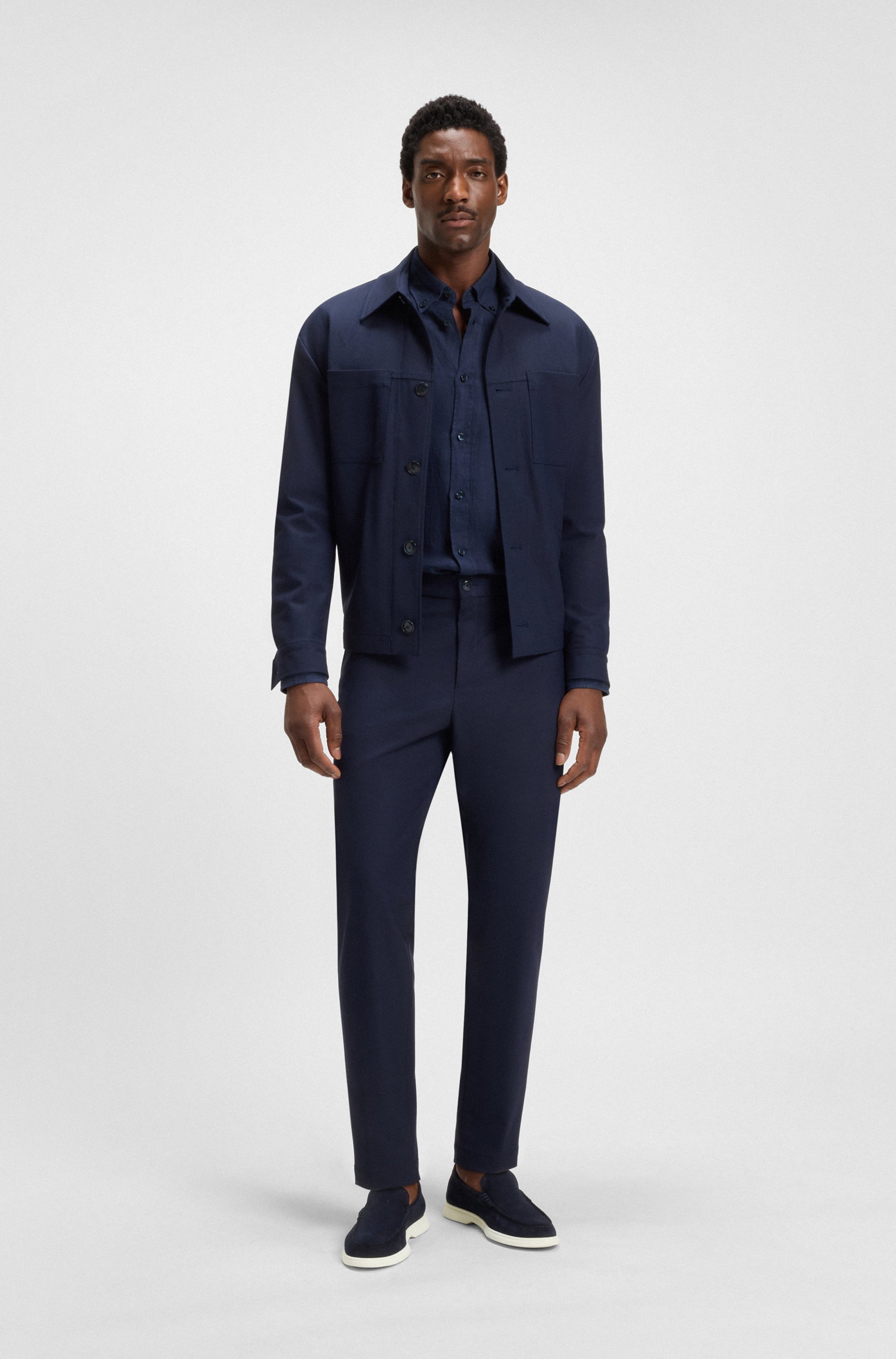 Suede loafers with debossed logo