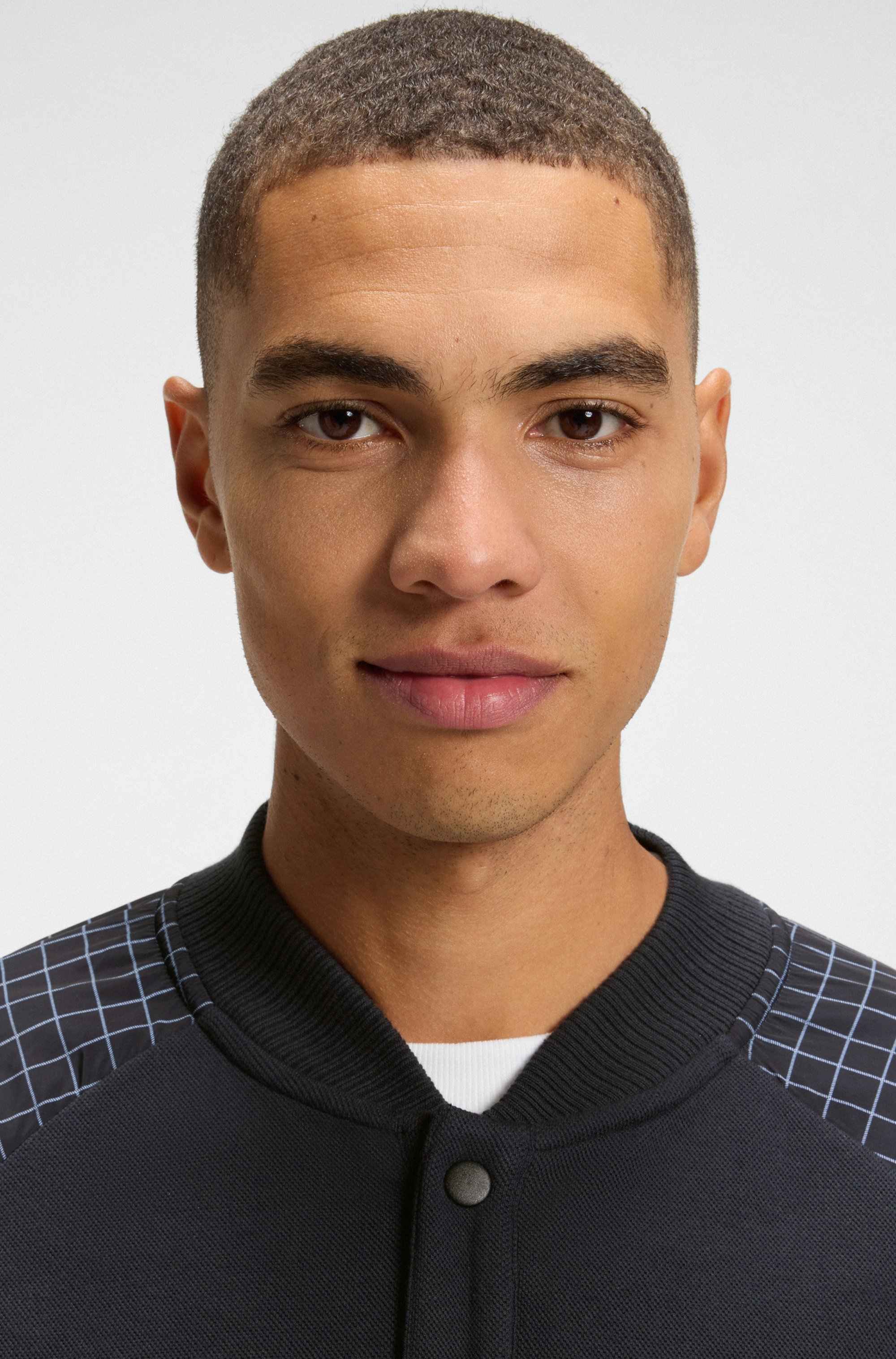 Check-print sweatshirt with buttoned front