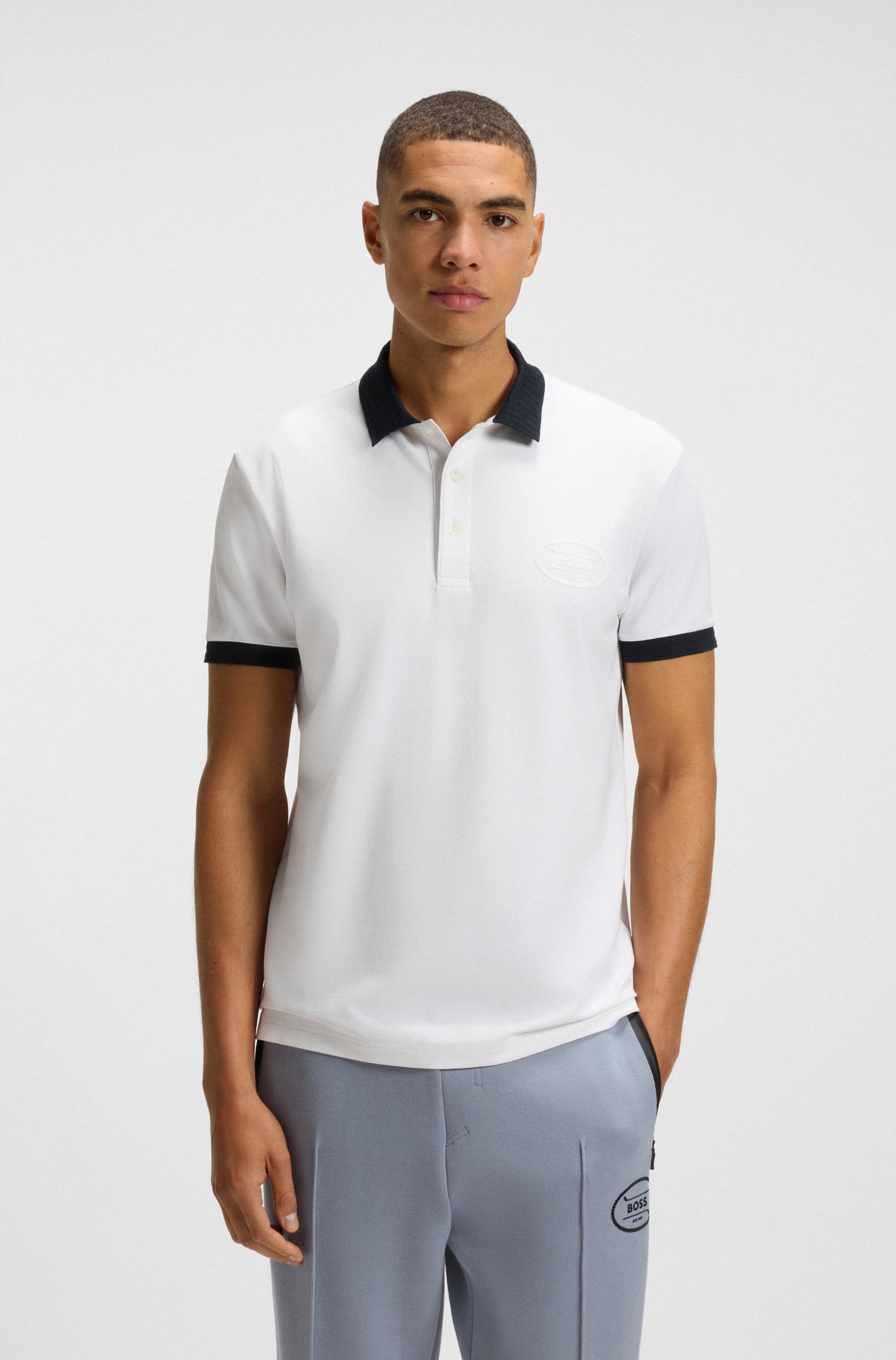 Cotton-blend polo shirt in moisture-wicking stretch piqué