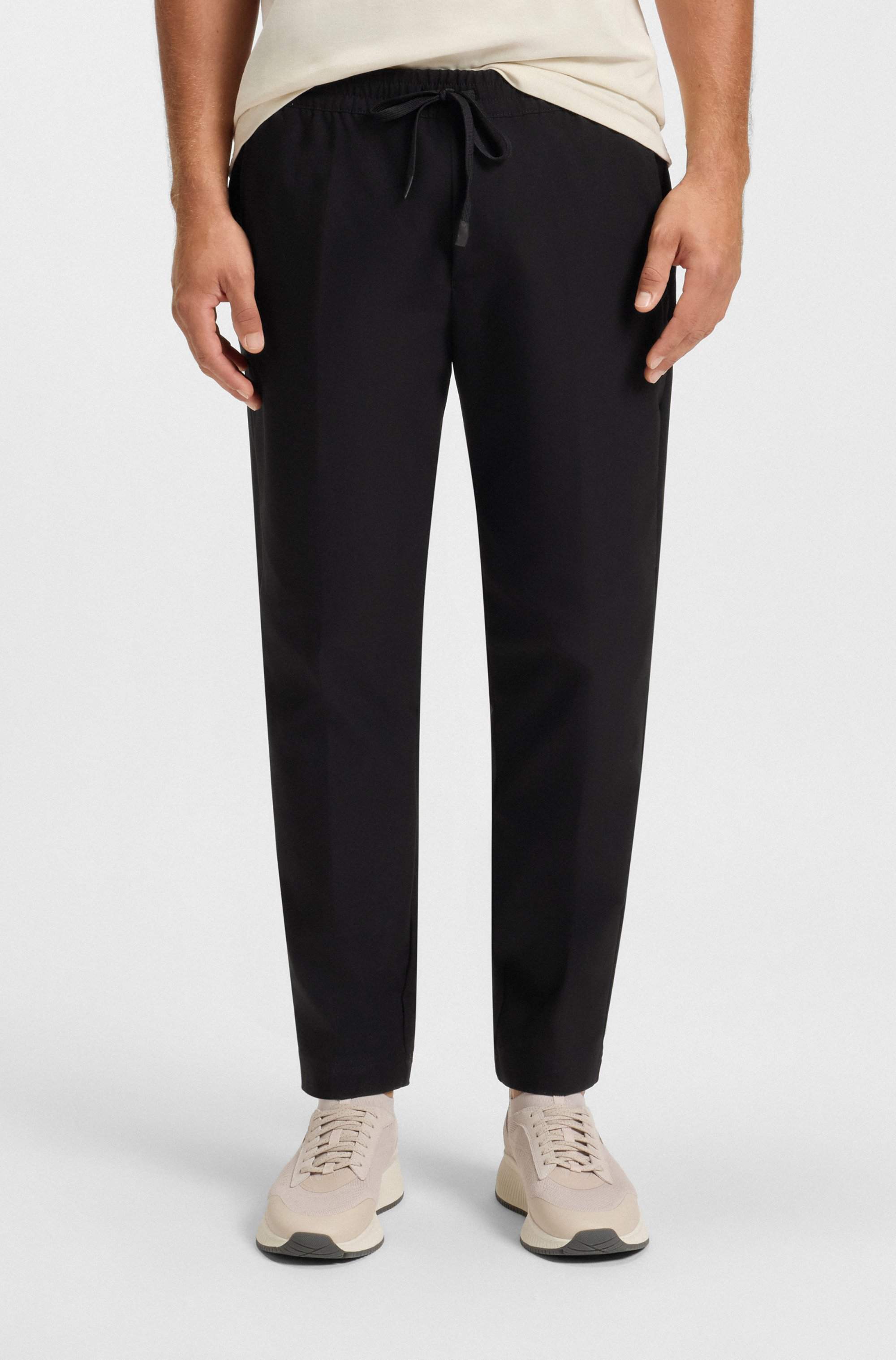 Water-repellent trousers in lightweight easy-iron fabric