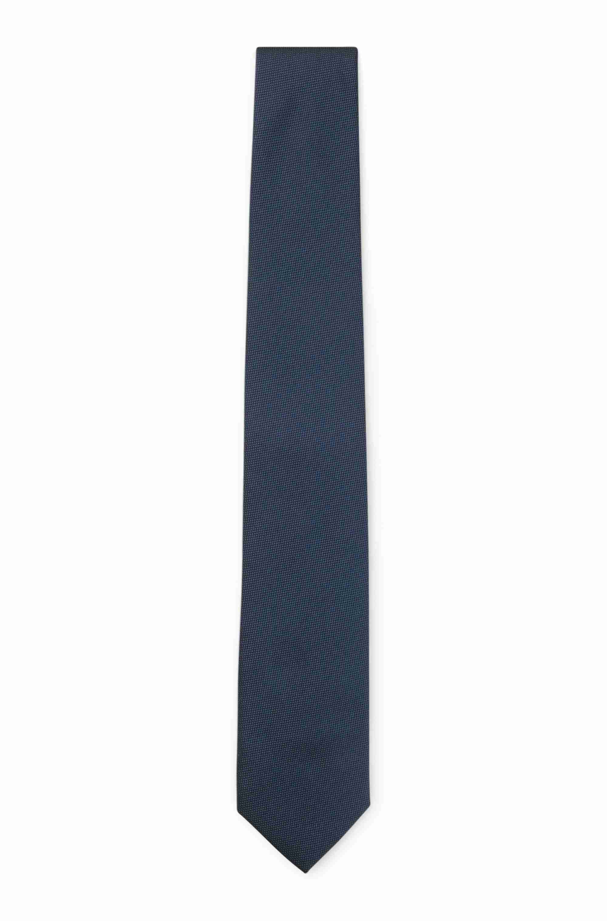 Tie with jacquard structure