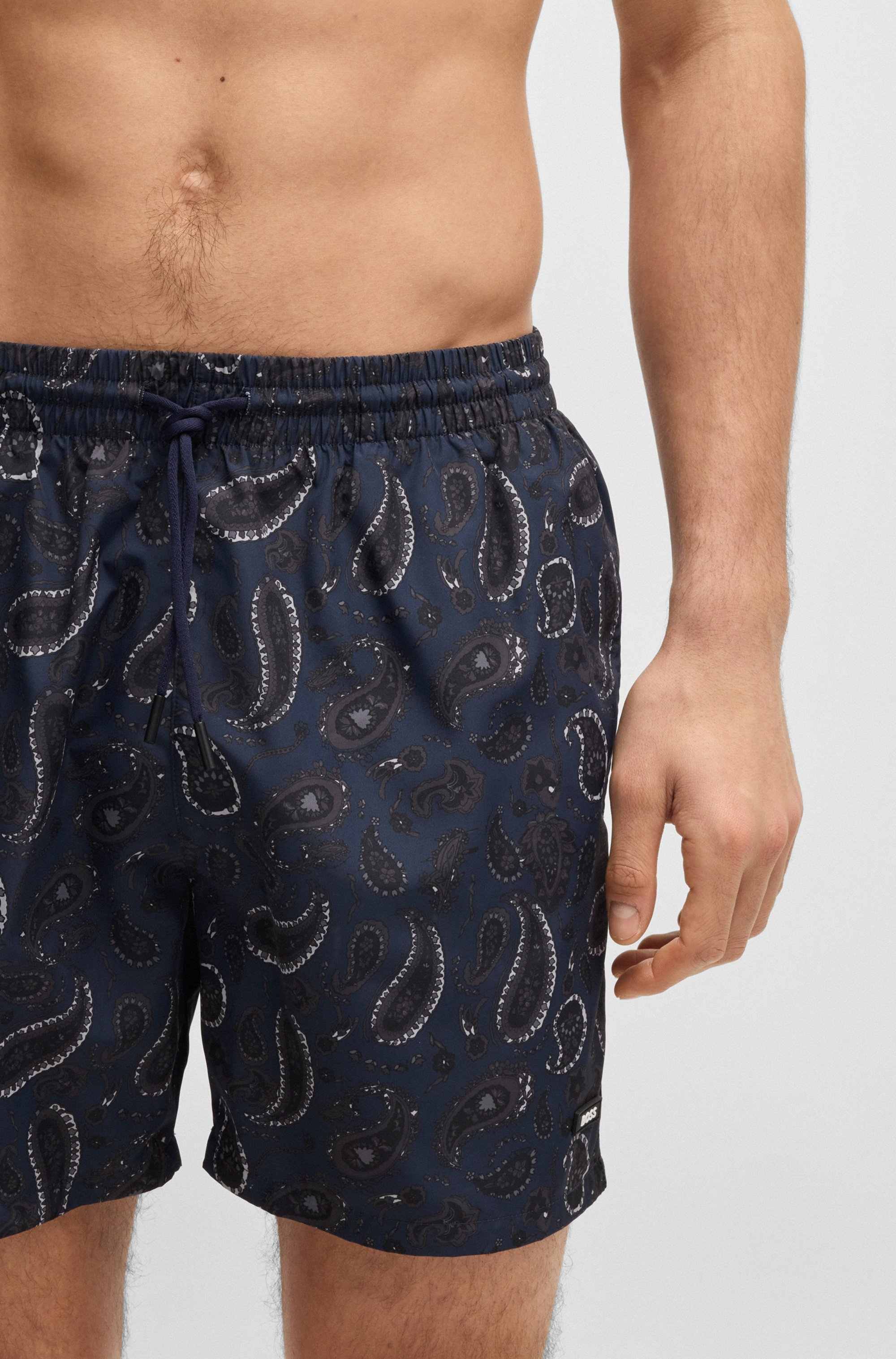 Paisley-print swim shorts with rubber logo