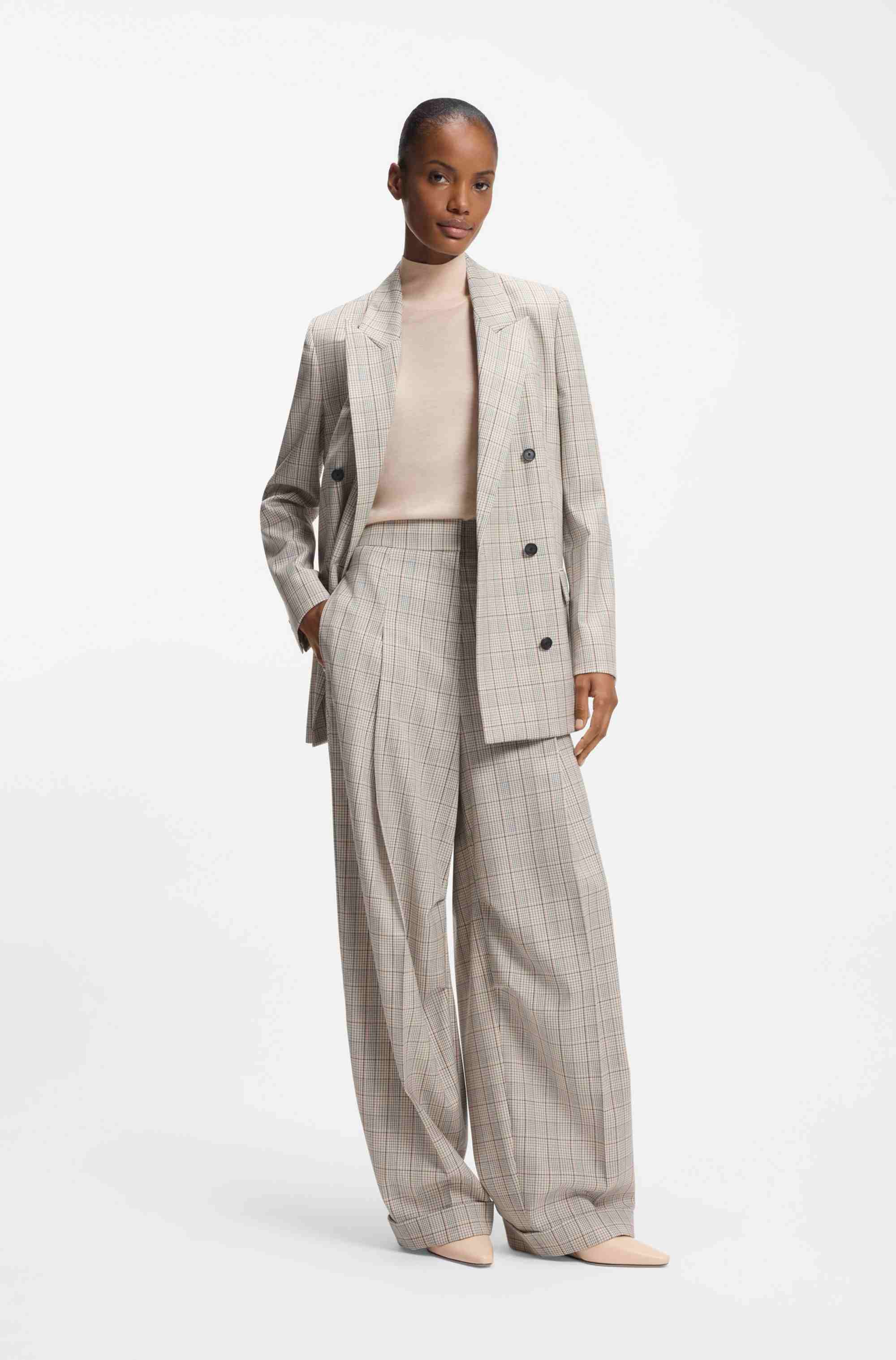 Sleeveless top in merino wool with mock neckline